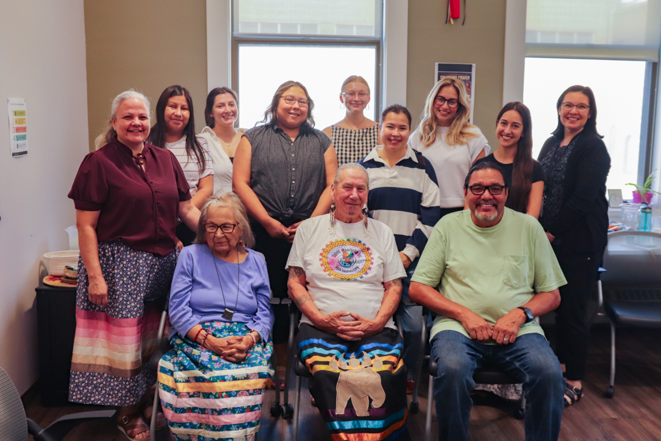 Group photo of Ongomiizwin leaders with students.