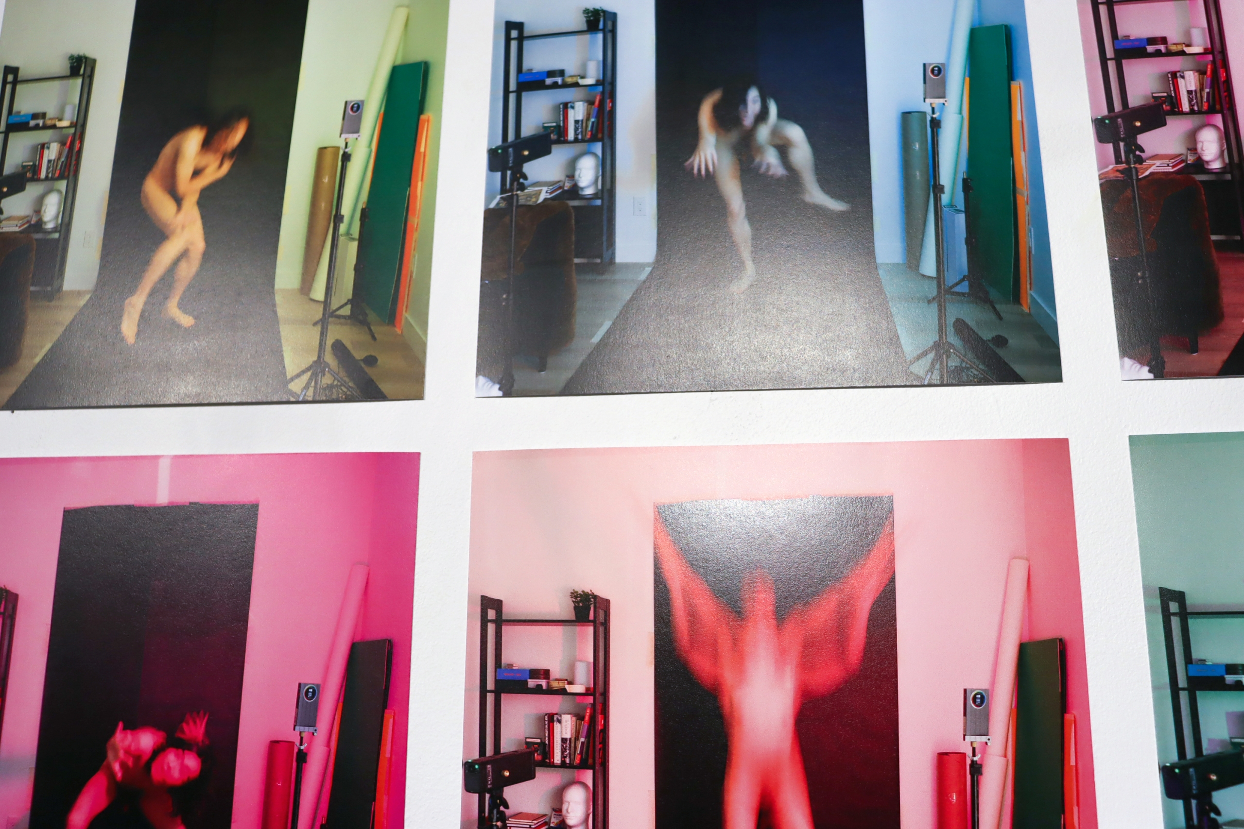 Close-up of photographic works showing blurred figure in motion across multiple panels