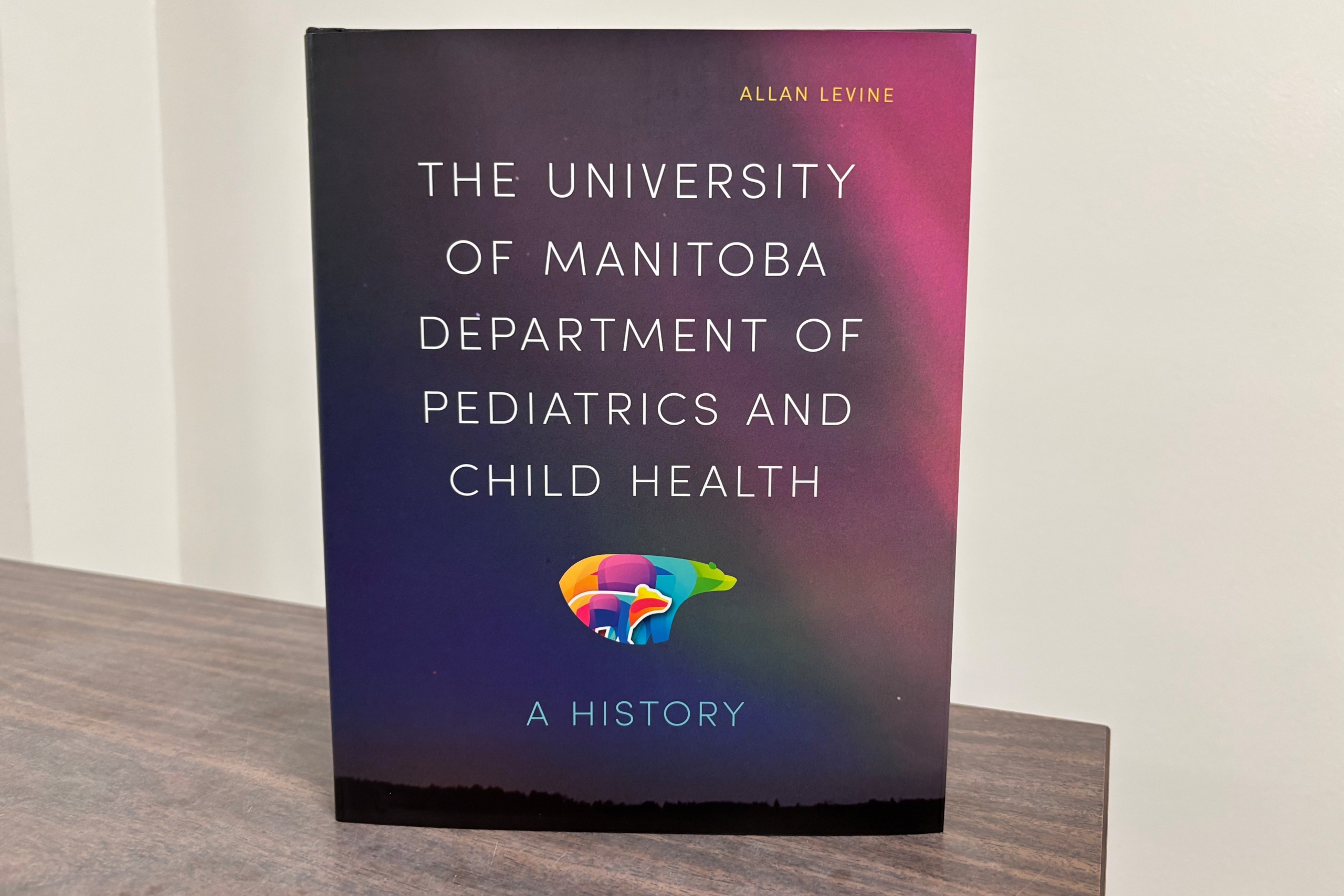 Cover of book called The University of Manitoba Department of Pediatrics and Child Health: A History by Allan Levine.