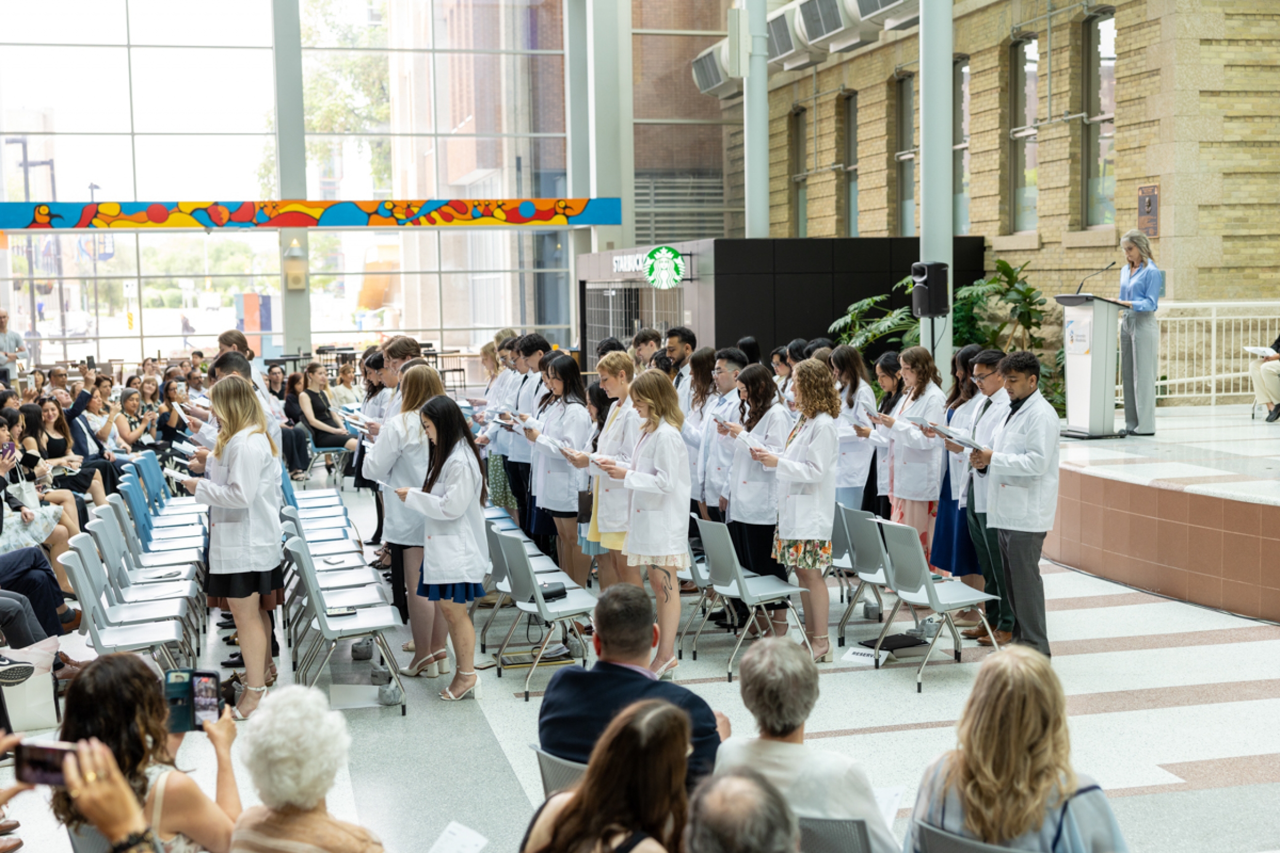 Students reading the Oath of the Pharmacist.