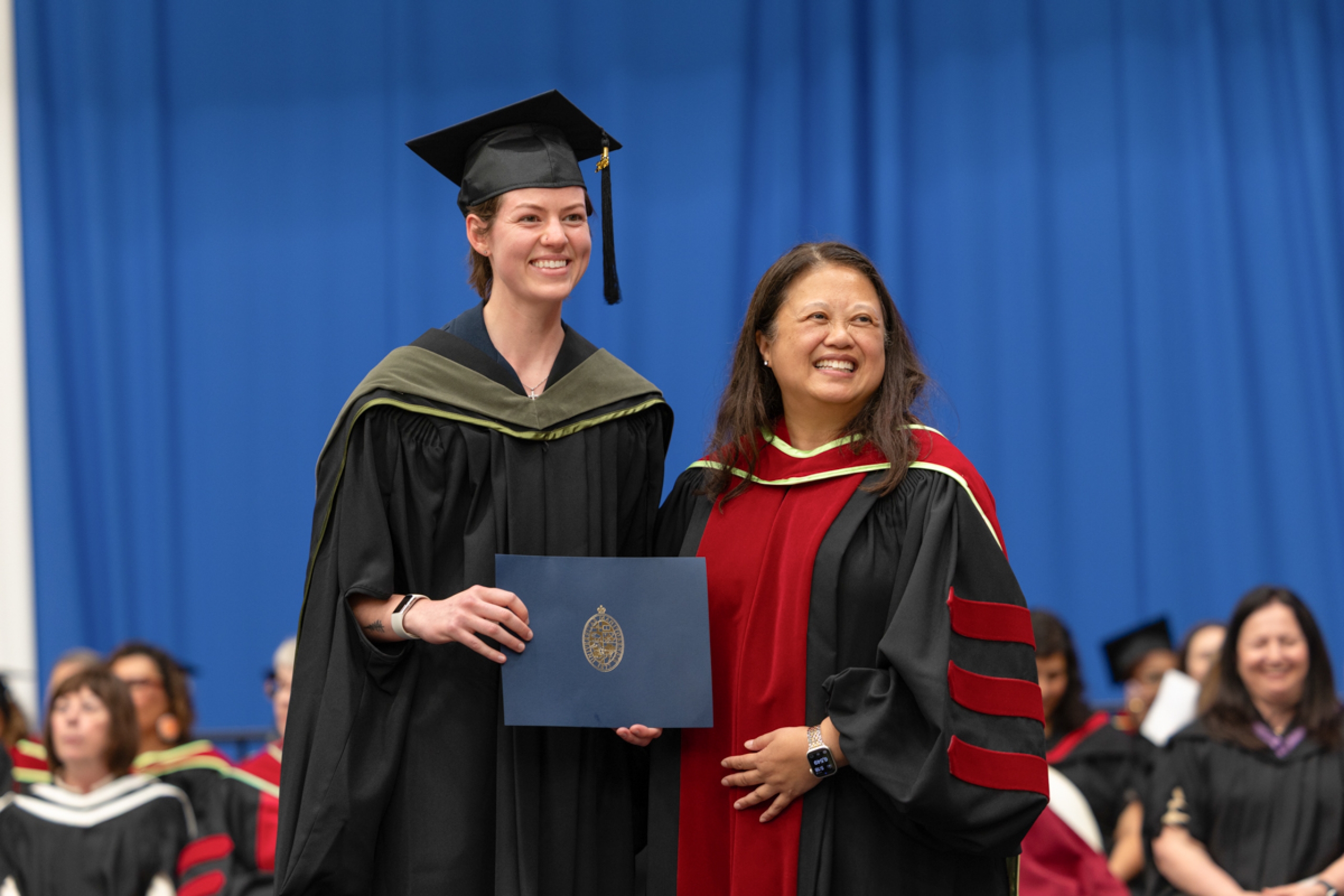 Graduate with dean.