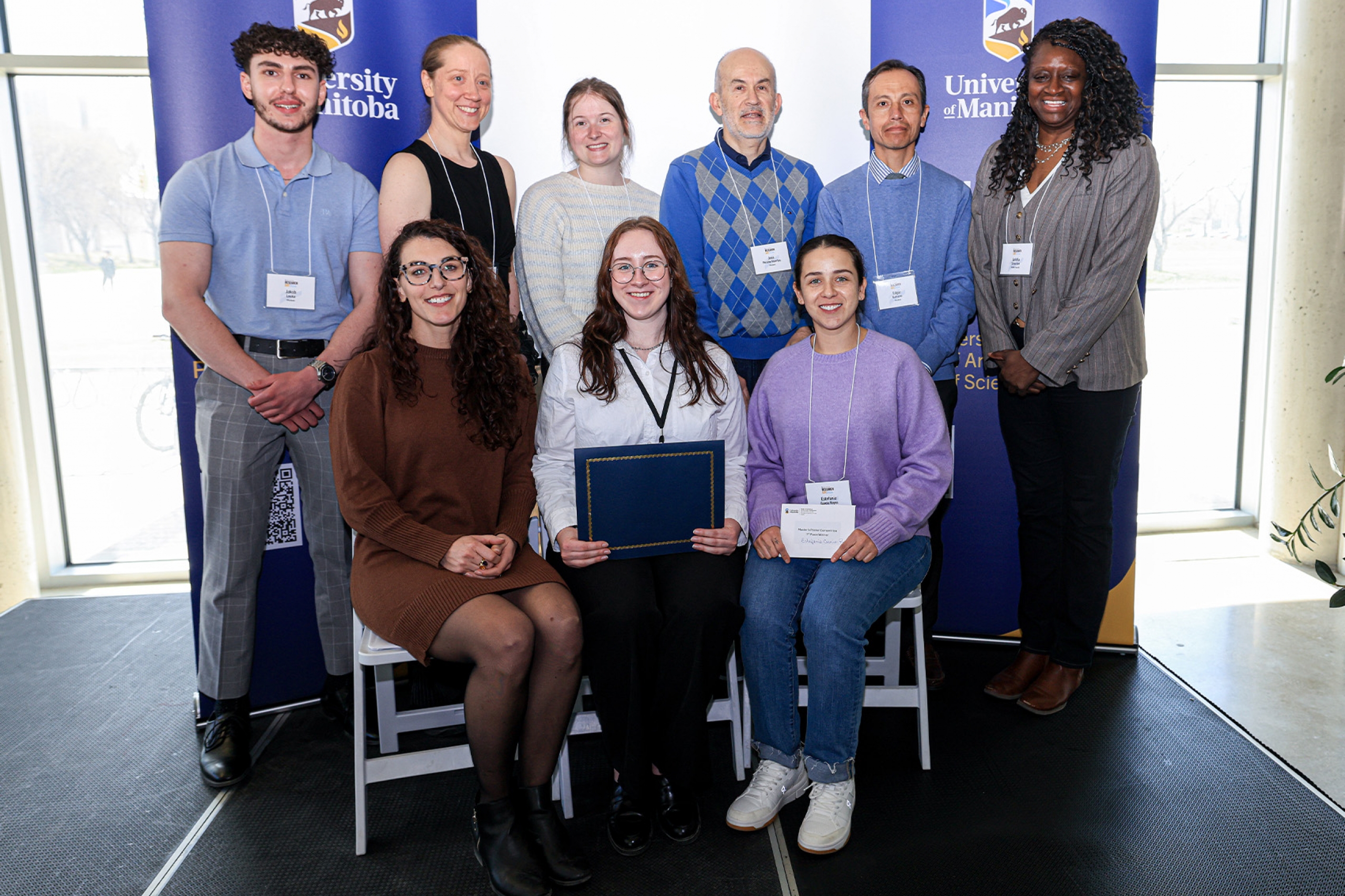 A group of award winner smiling at Research Day 2026