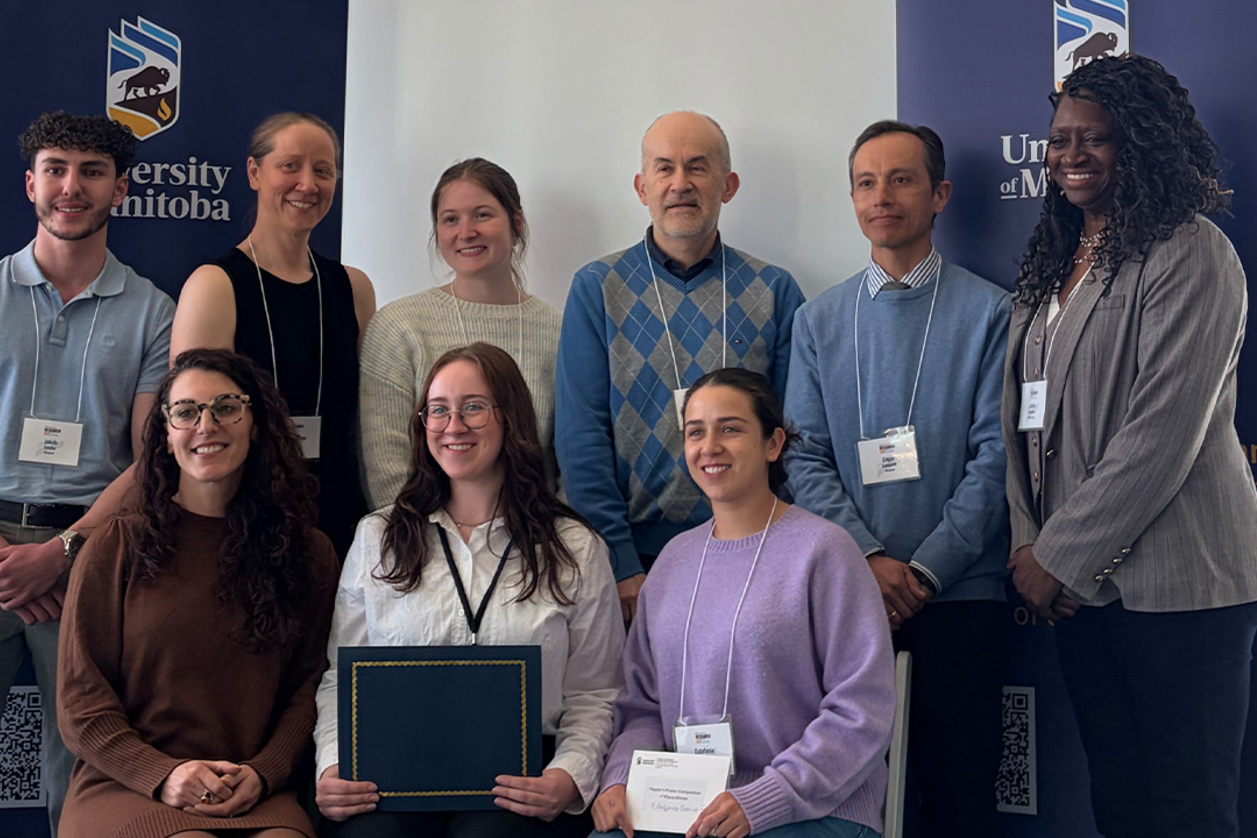 A group of award winner smiling at Research Day 2026