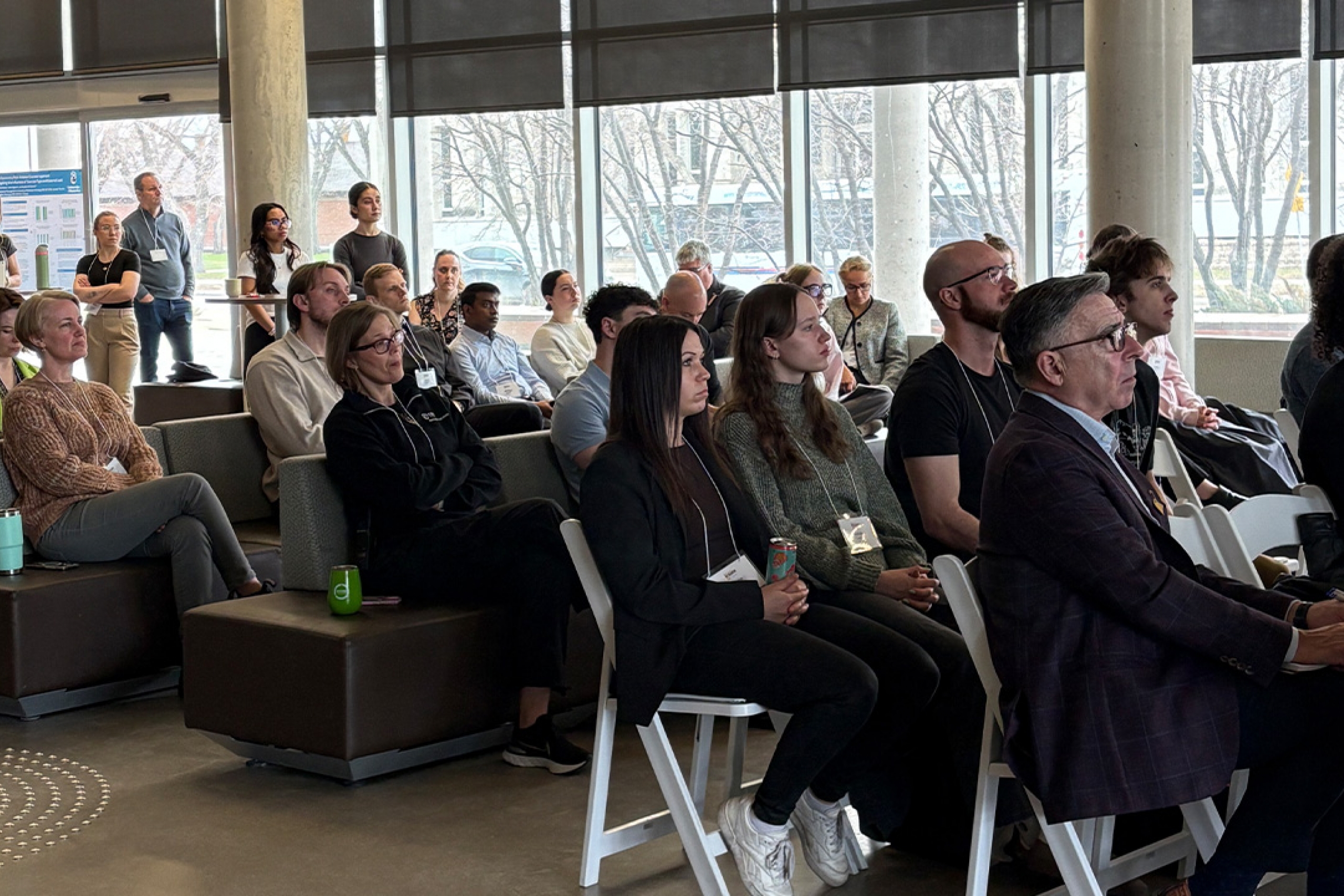 The audience during Research Day 2026 sitting and listening to the keynote