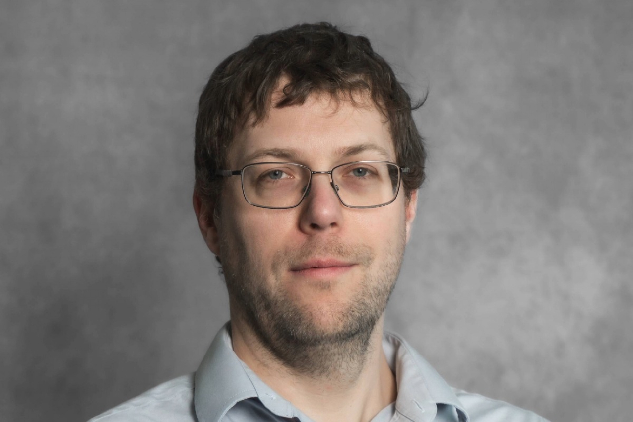 Headshot image of Dr. Christiaan Righolt.