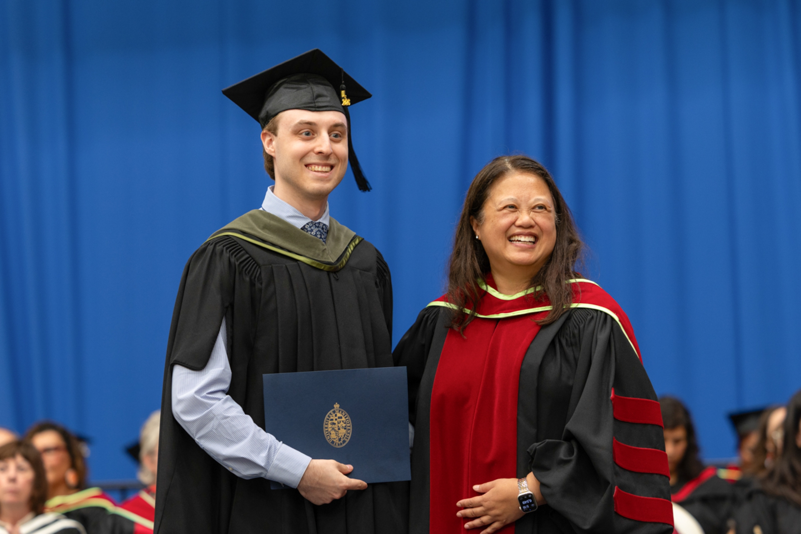 Graduate with dean.