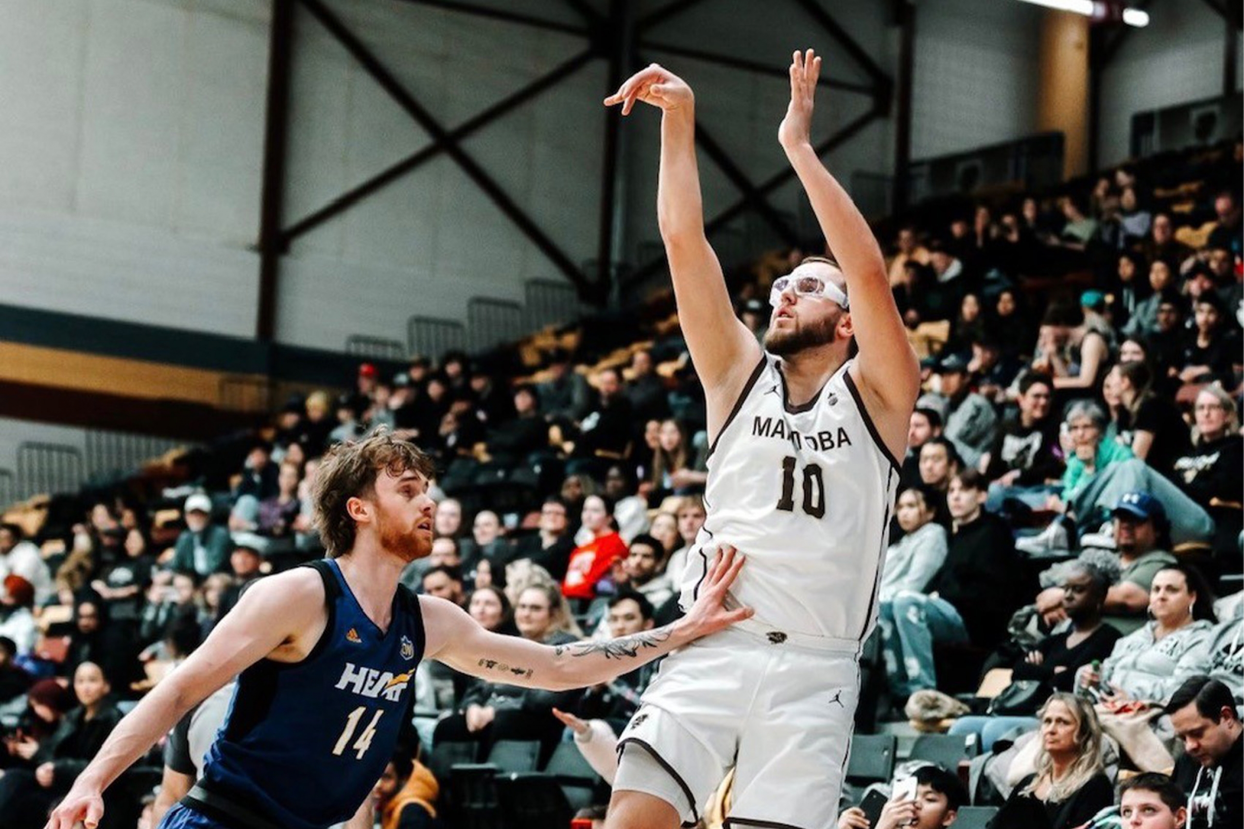 Sam Jensen after shooting a basket