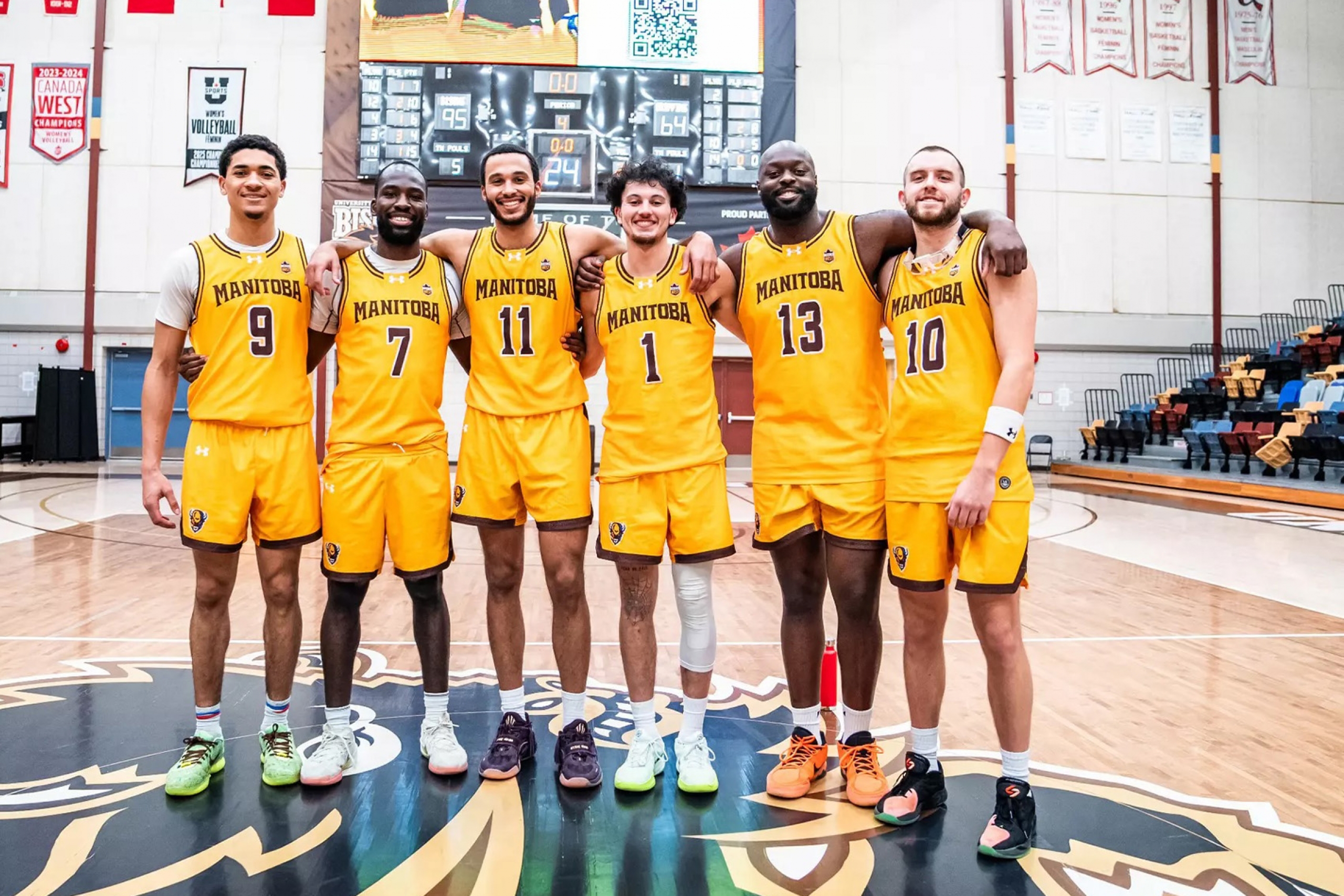 Sam Jensen with other graduating men's basketball athletes