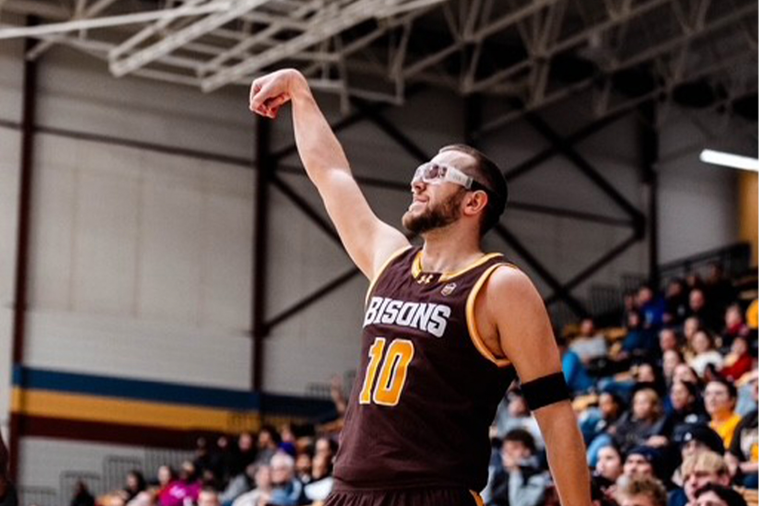 Sam Jensen waving goodbye to the ball after a shot