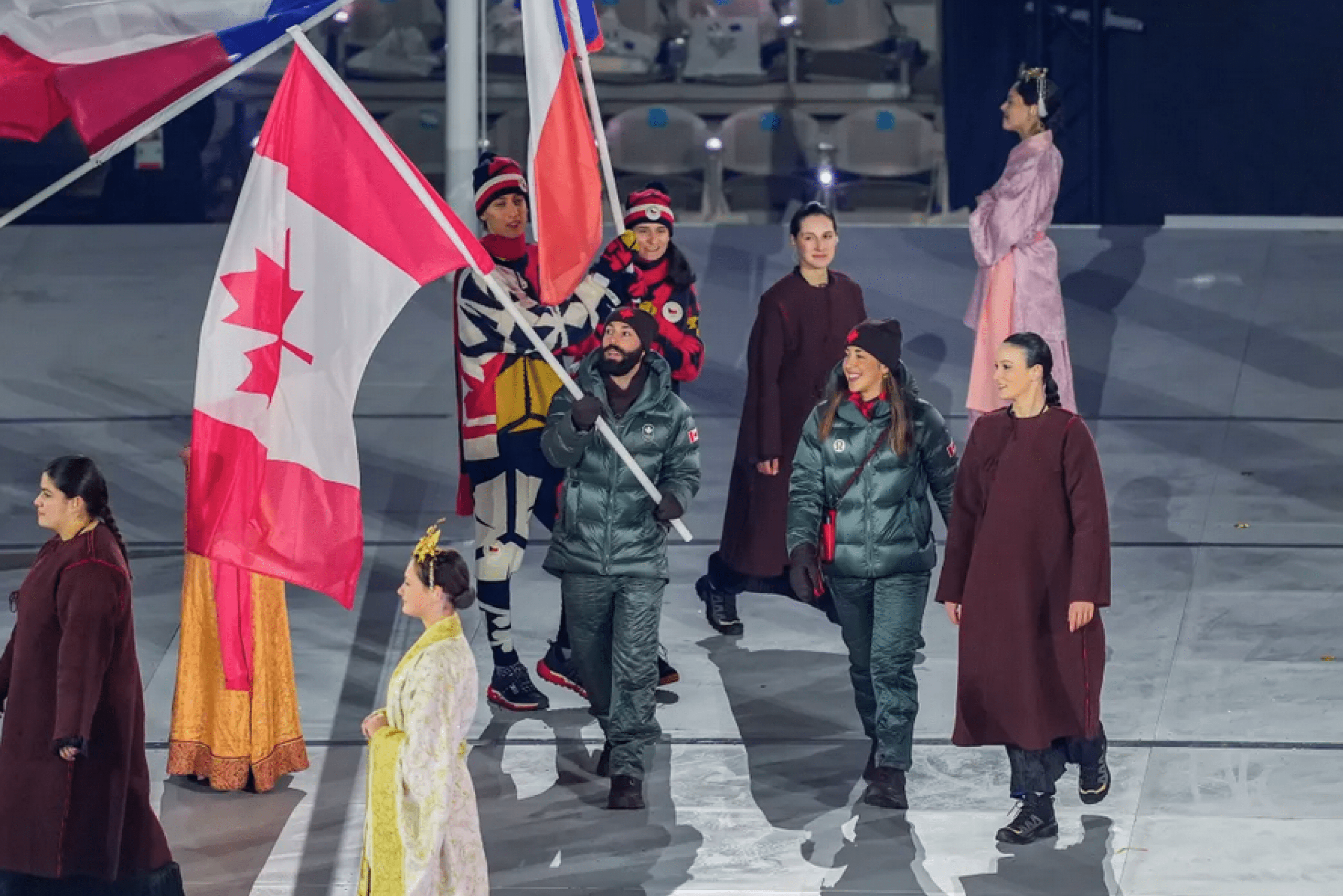 Team Canada flag bearers at the 2026 Milano-Cortina closing ceremony.