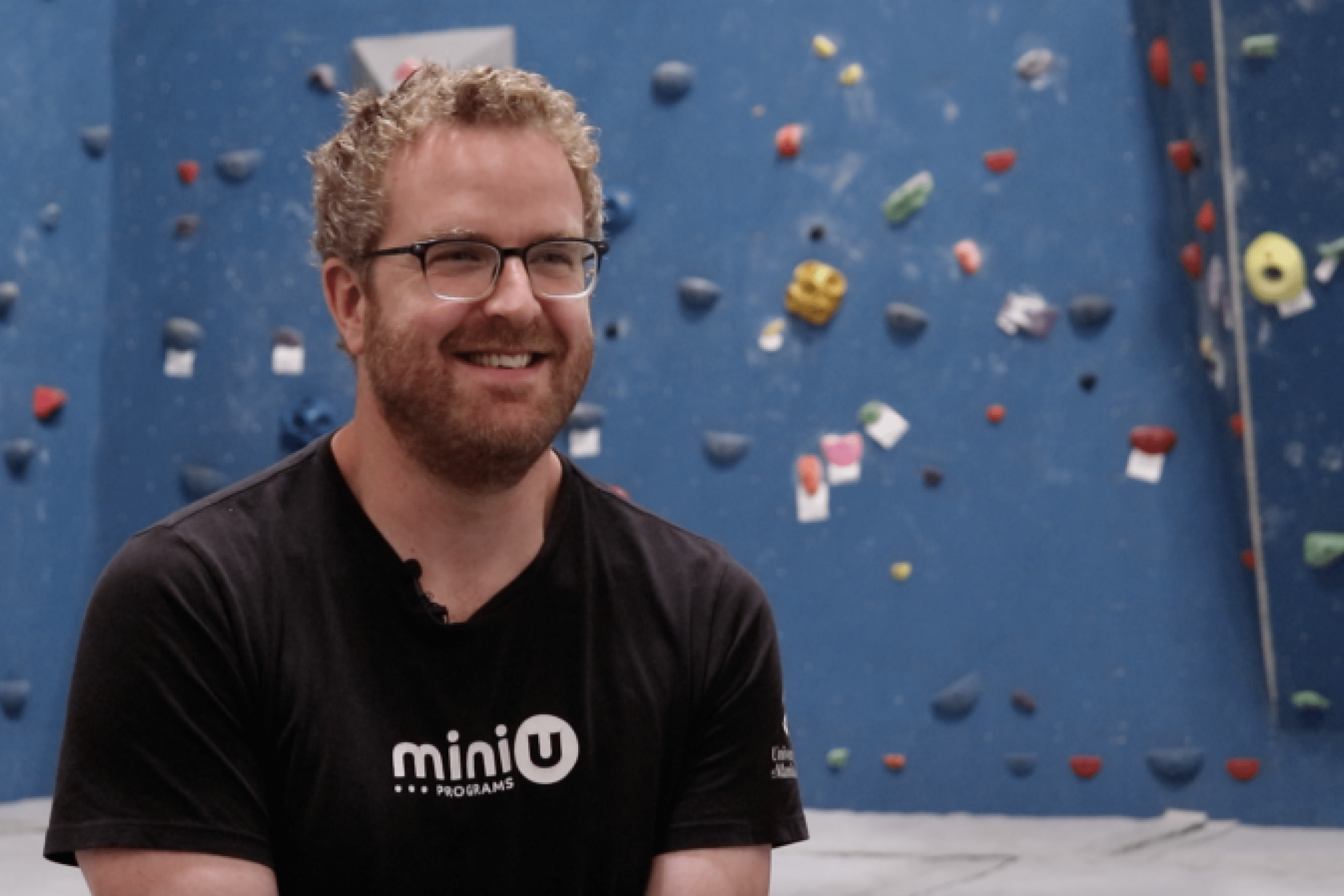 Drew Sheffield in the UM bouldering room