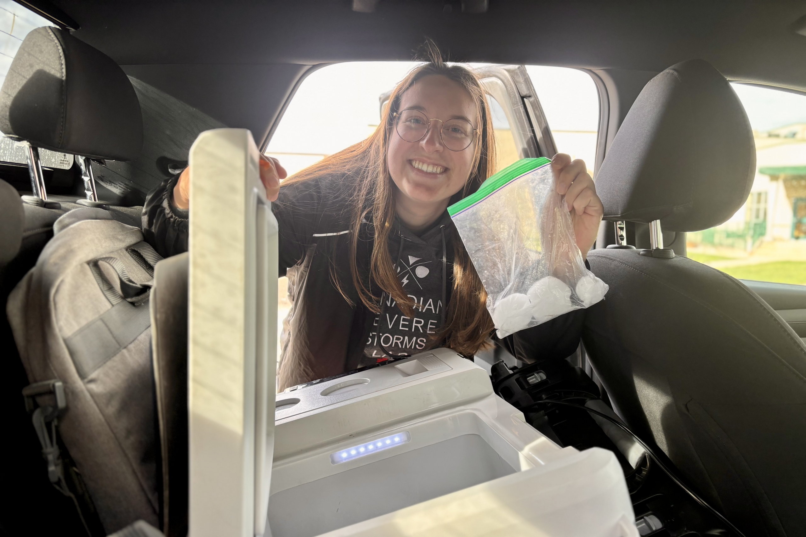 Alex Shupenia holding hail sample
