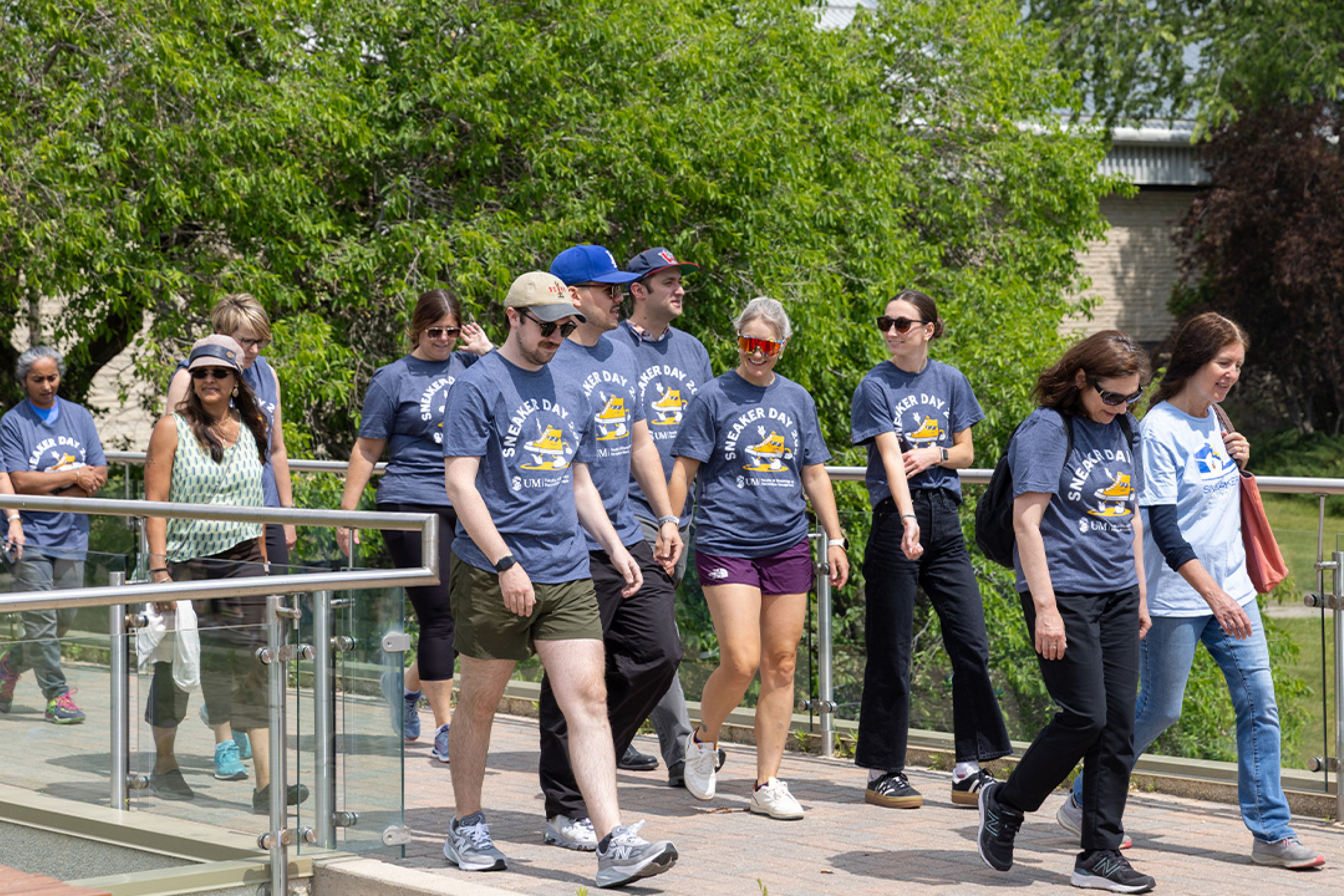 A group walking and talking during Sneaker Day 2025