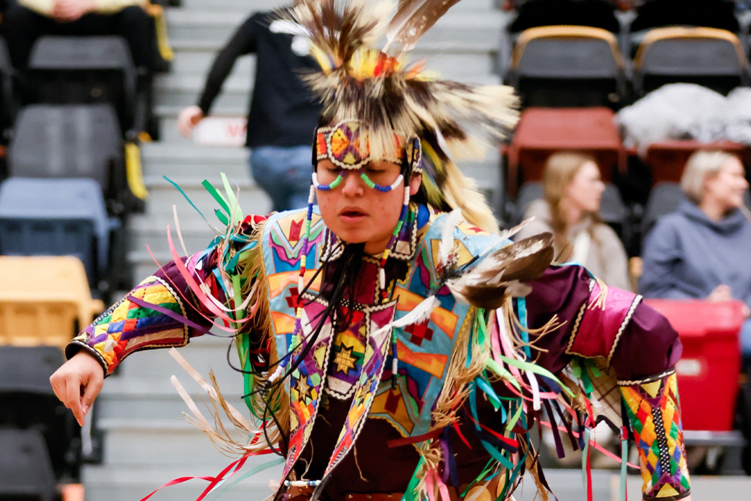 An Indigenous dancer performing during spirit of the bison