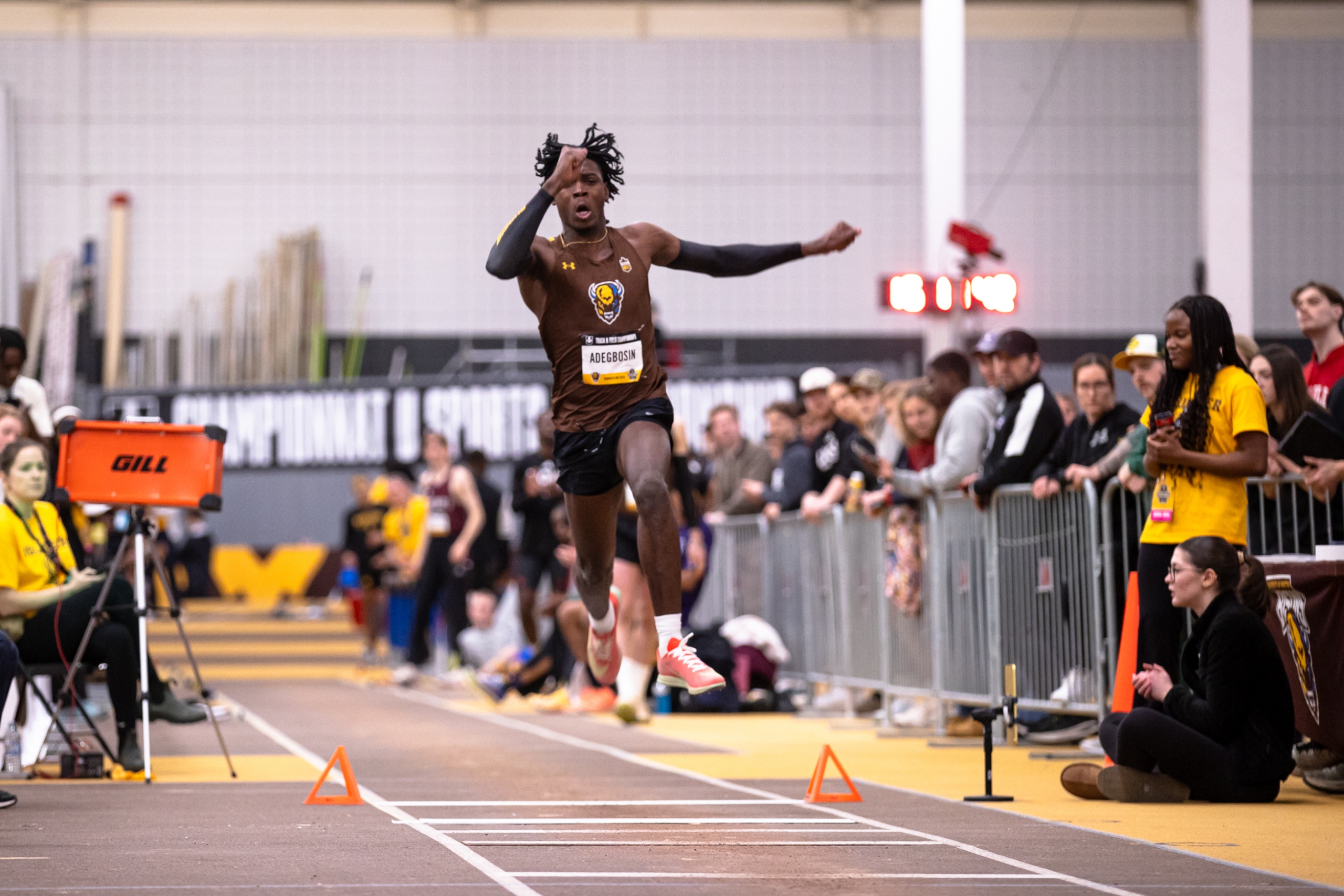 Adebare Adegbosin running towards the long jump pit