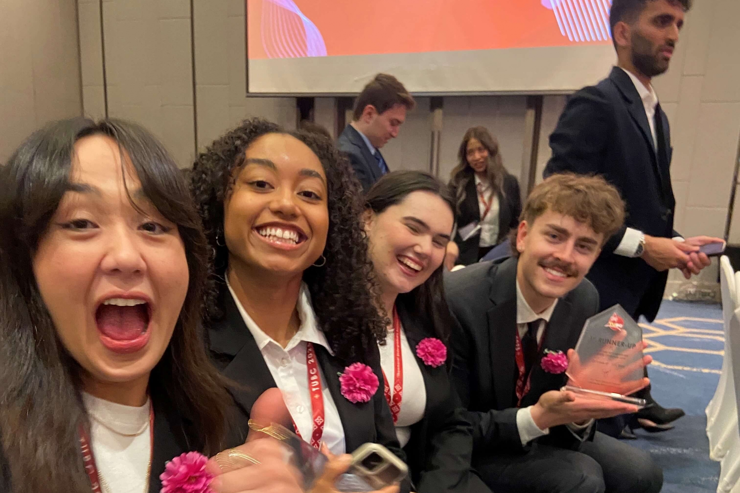 The four Asper BComm students celebrating.