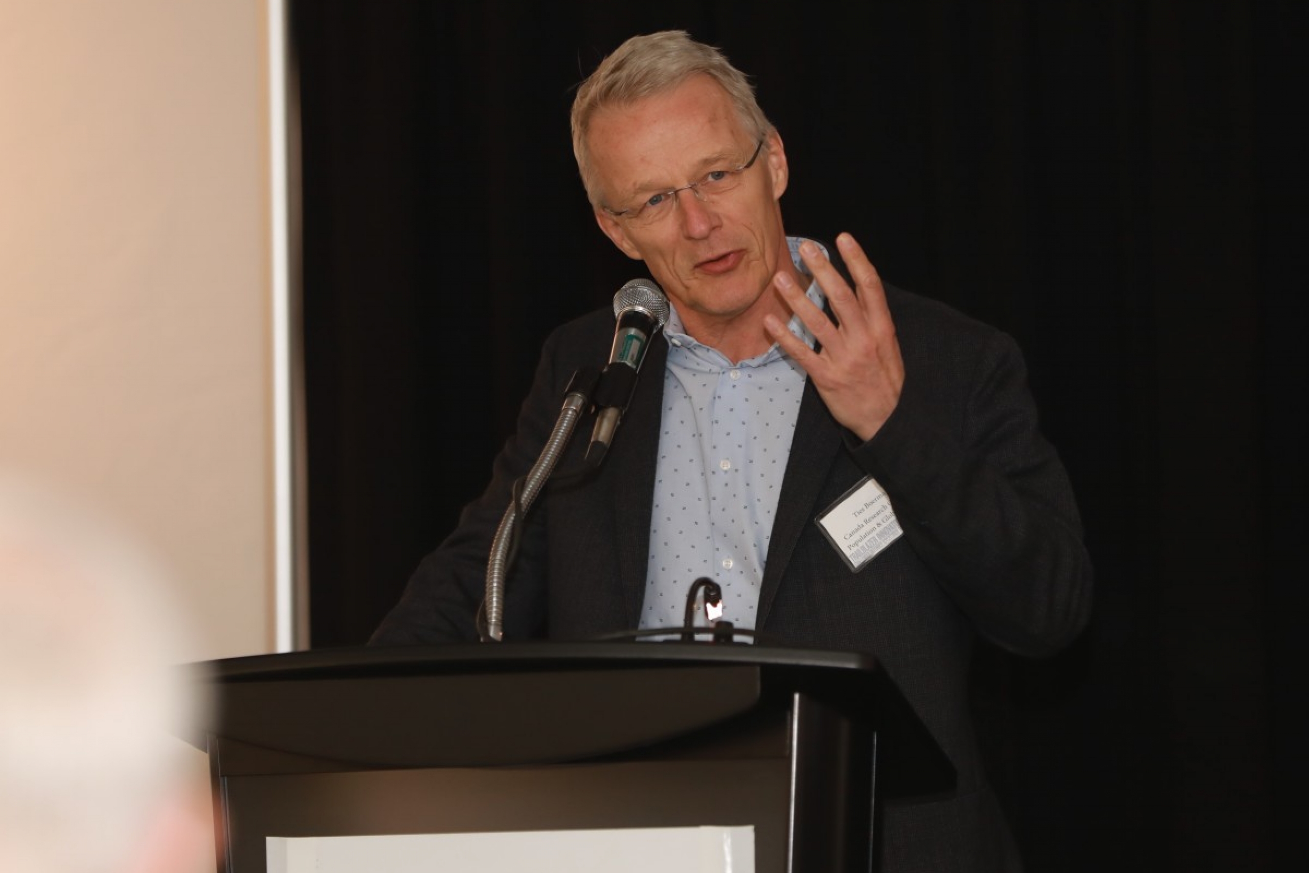 Dr. Ties Boerma speaks at an event.