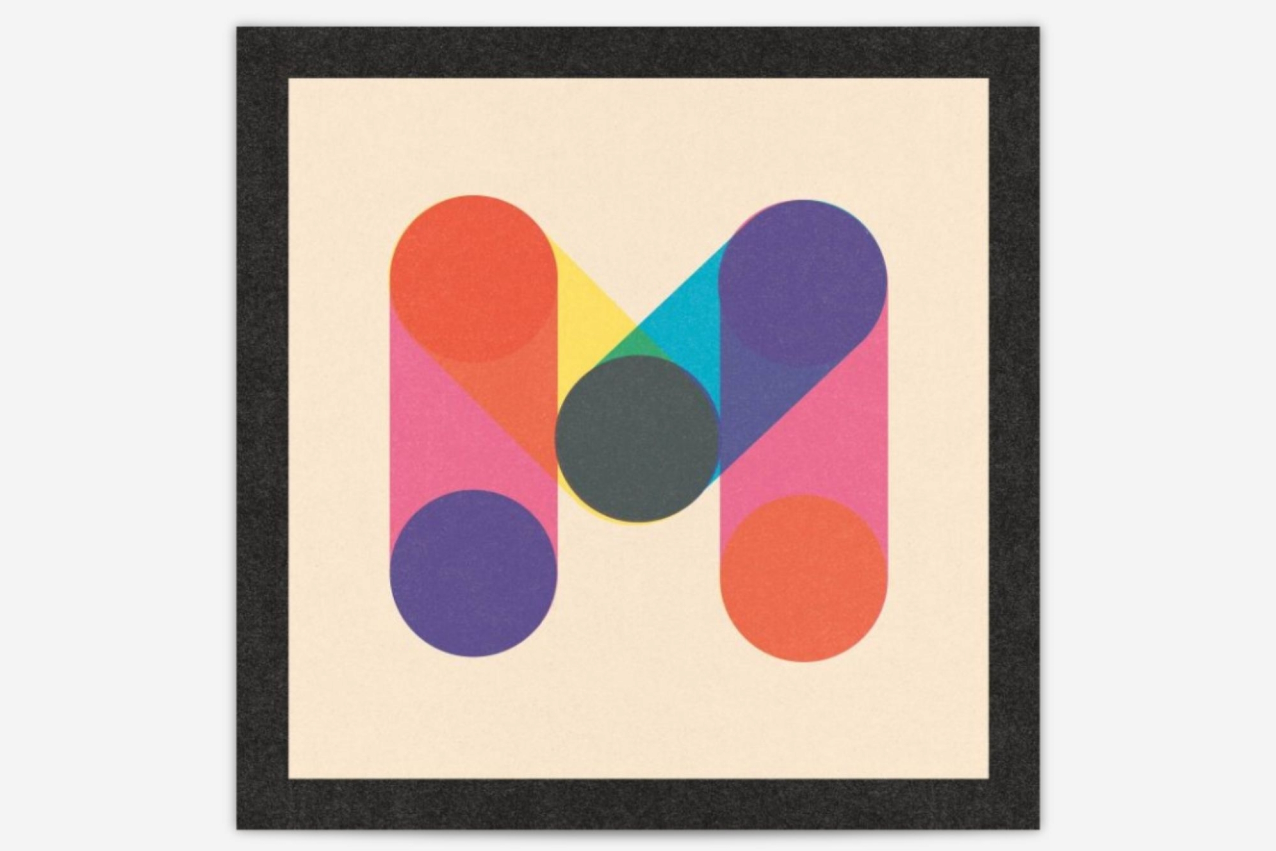 Malia Davis’s winning TypeFight 2025 design featuring a bold geometric “M” composed of overlapping colourful circles and shapes.