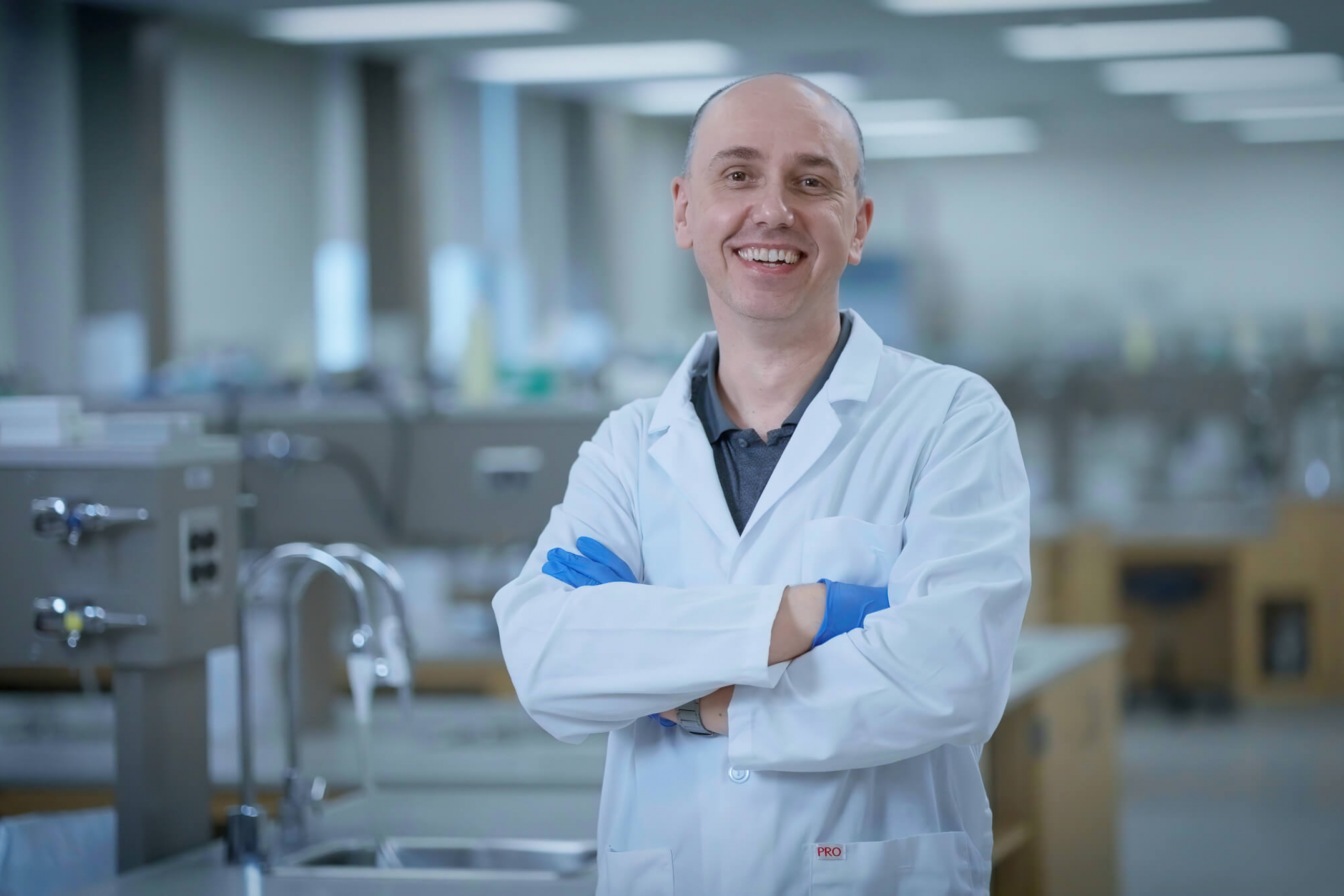 Peter Pelka, a professor in the Department of Microbiology at UM, in a lab