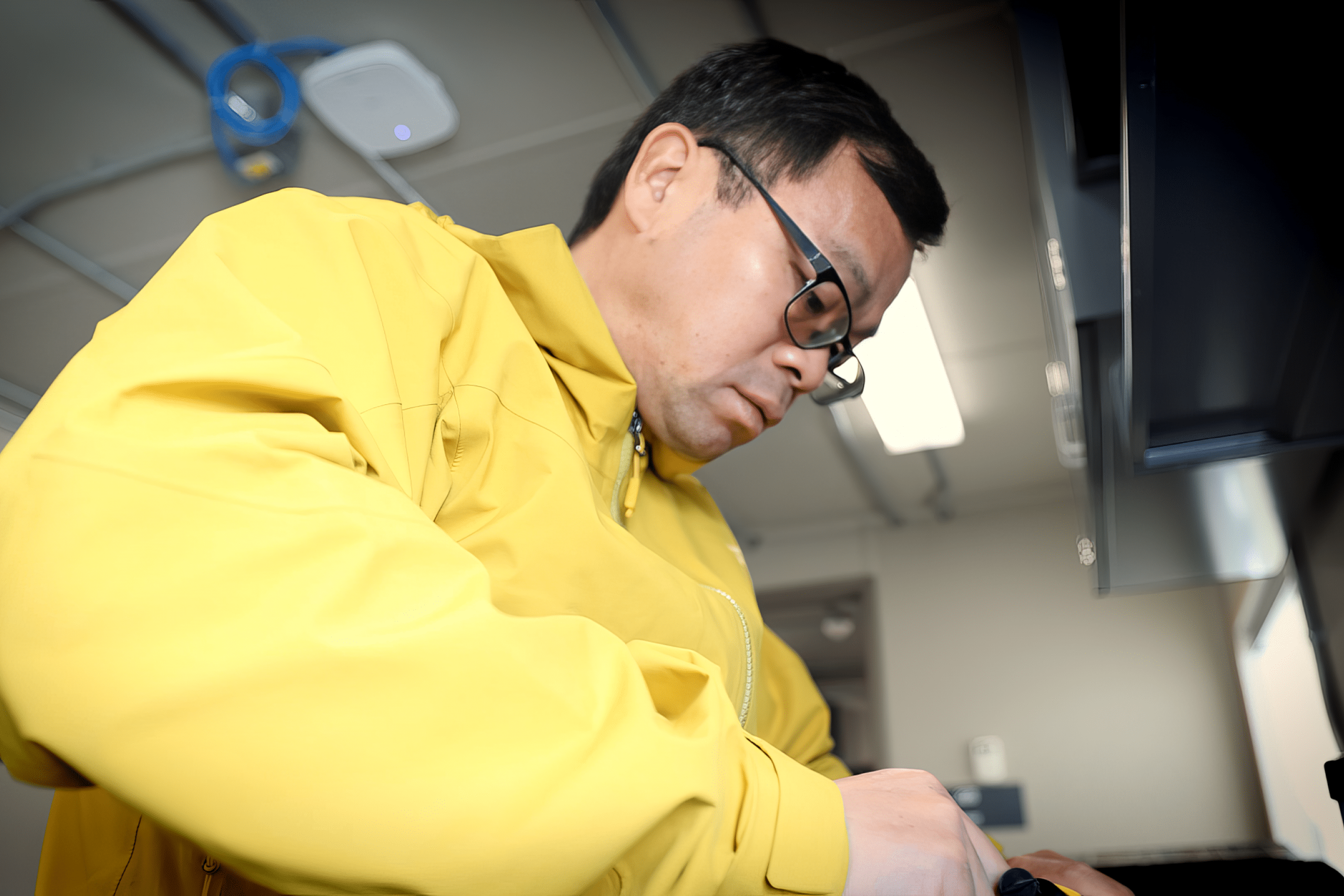 Feiyue Wang, a Professor at the University of Manitoba and a Tier-1 Canada Research Chair in Arctic Environmental Chemistry, in a lab