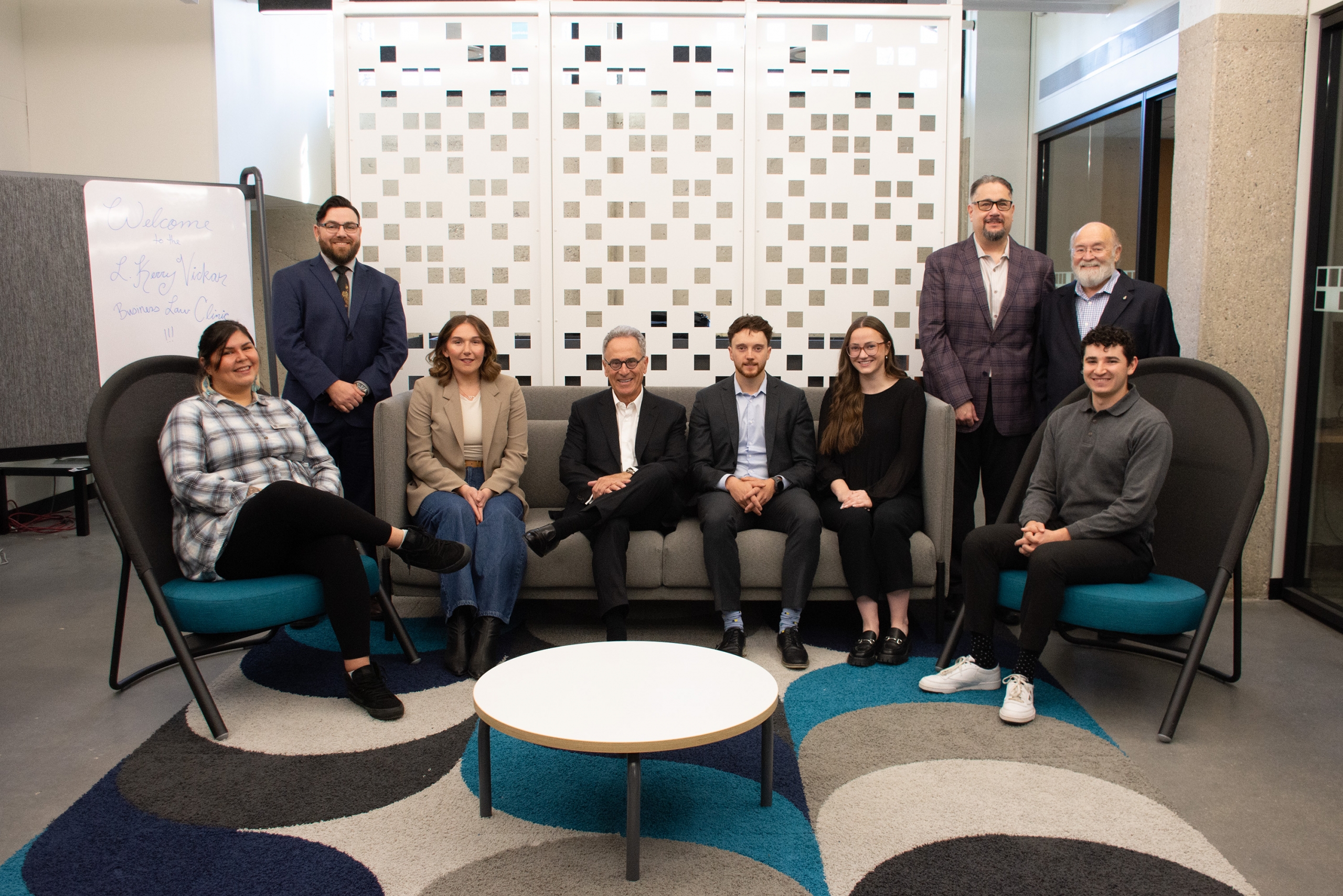 L. Kerry Vickar’s third visit to meet with third-year law students at his namesake business law clinic. Left to right: Jessica Canard, Yvan Larocque (Clinical Counsel), Tina Lerner, L. Kerry Vickar [LLB/80; LLD/25], Paul Chorney, Vanessa Smith, Dr. Richard Jochelson (Dean of Law), Nick Slonosky [BComm/76; LLB/79] (Supervising Lawyer), and Gilad Stitz. Photo by Christine Mazur.
