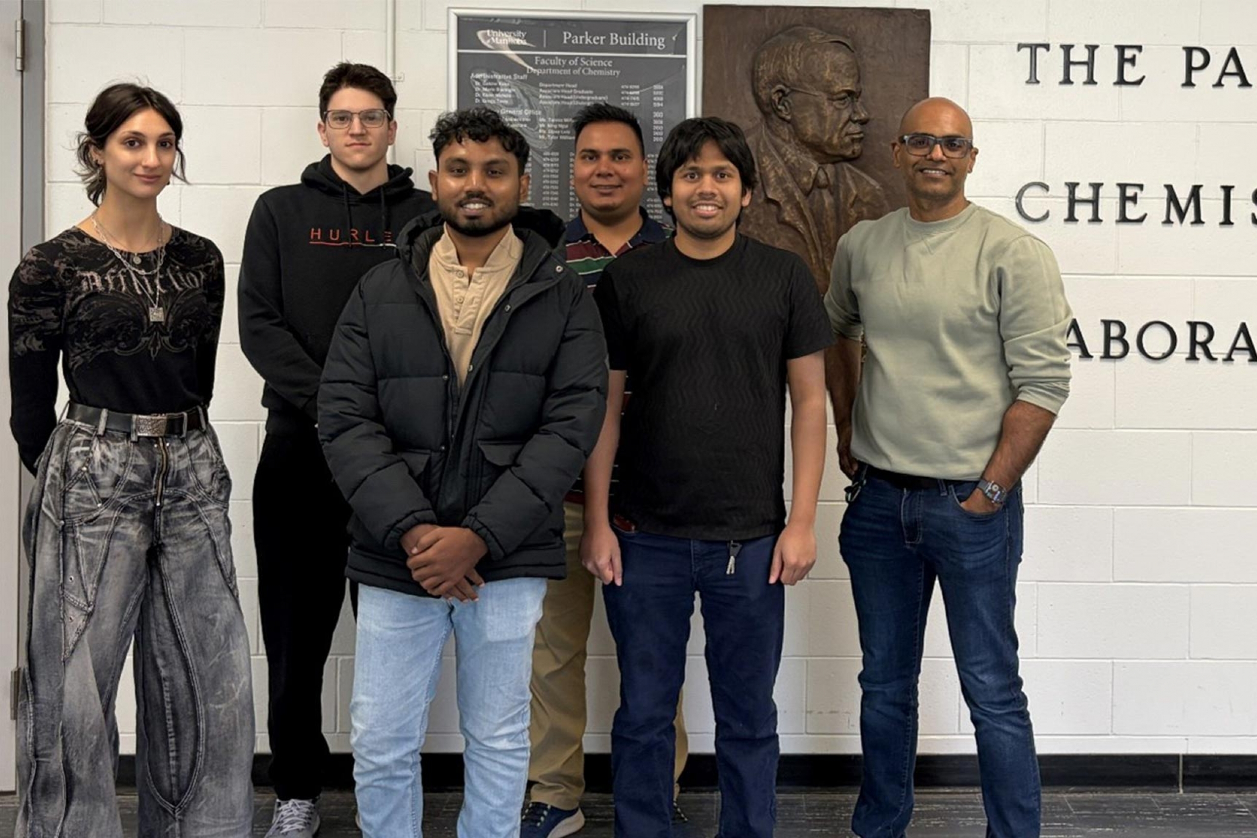 Abishek Iyer with five of his lab members.