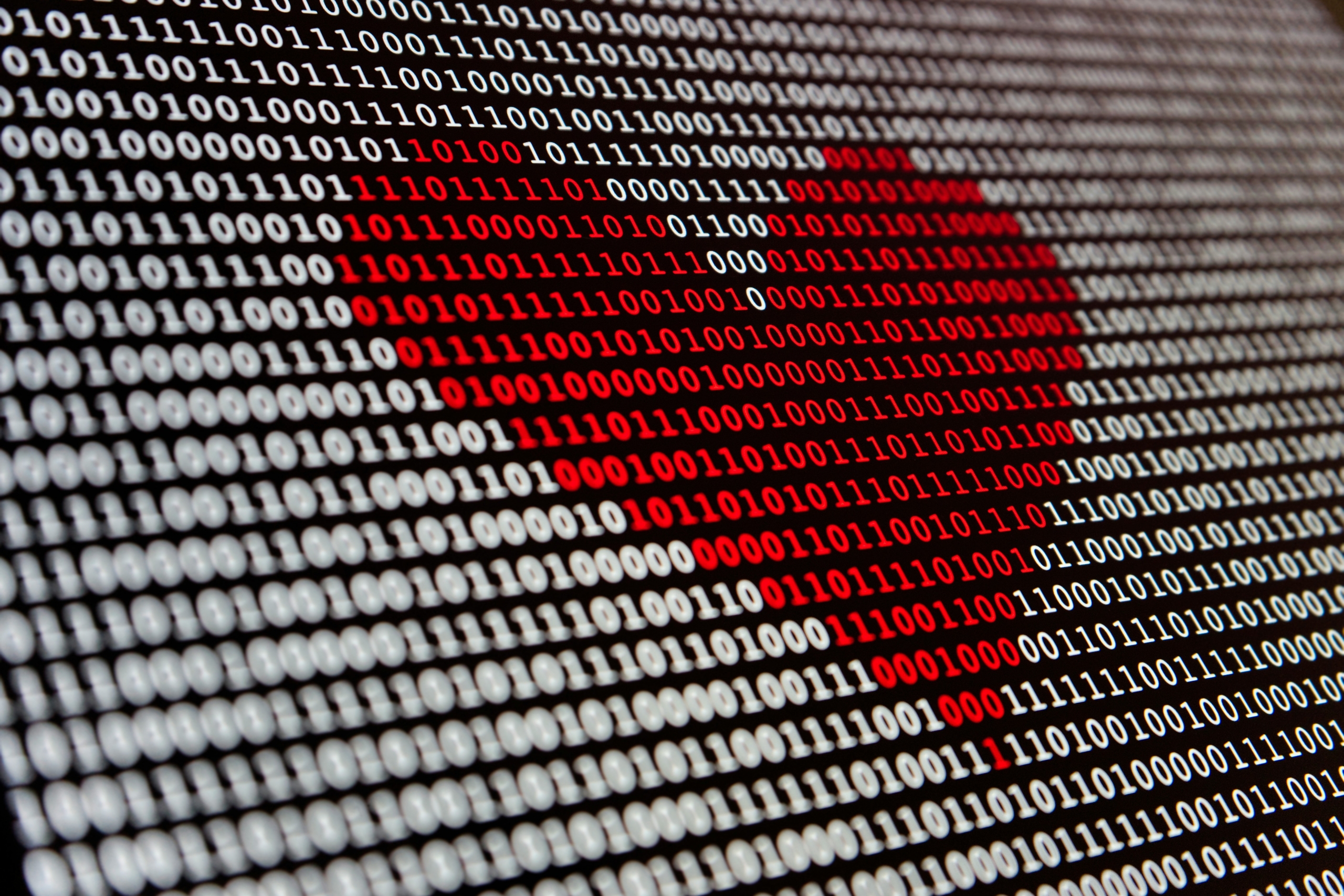 Data code with red data in shape of a heart