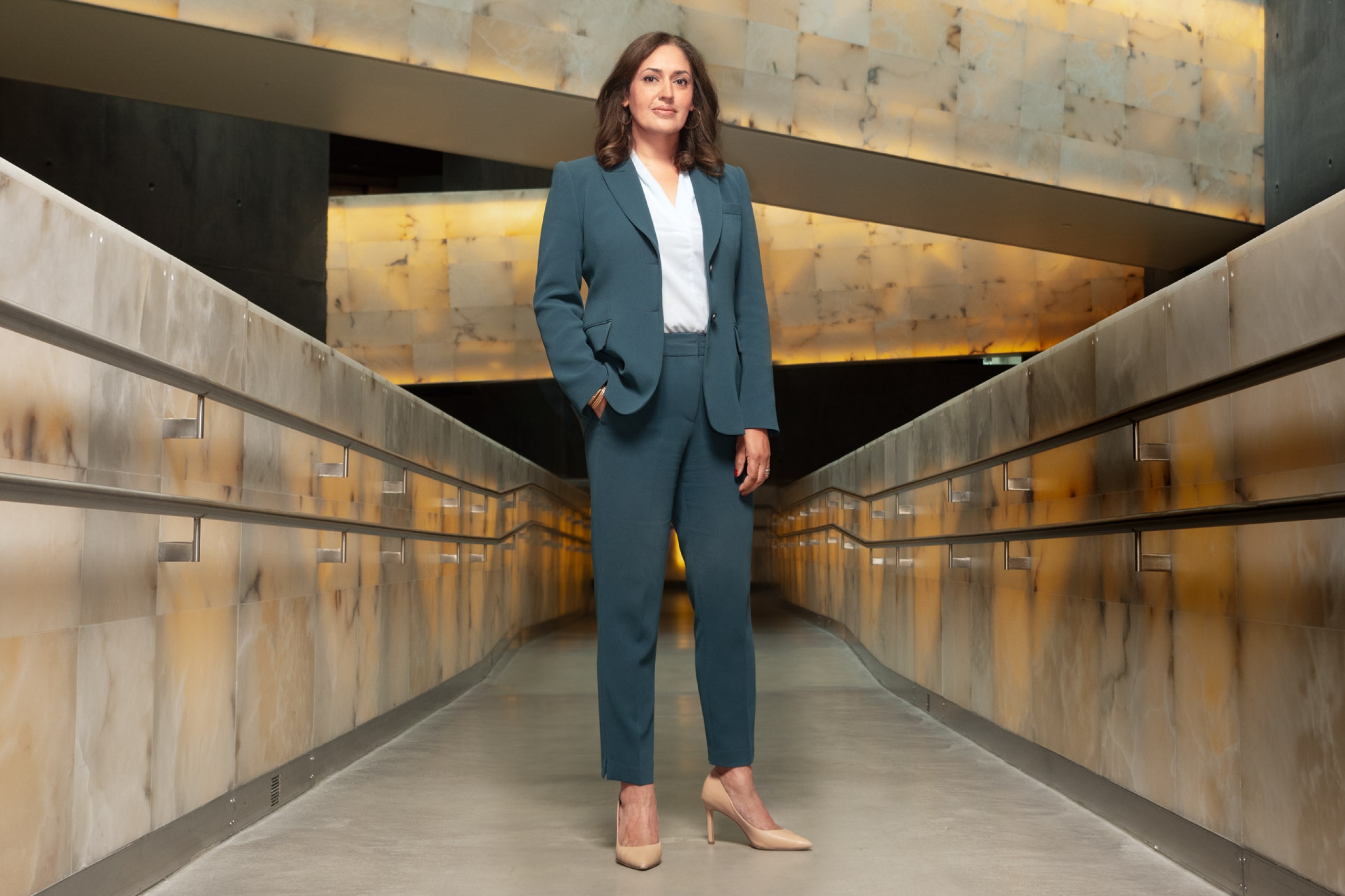 Isha Khan stands in the Canadian Museum for Human Rights