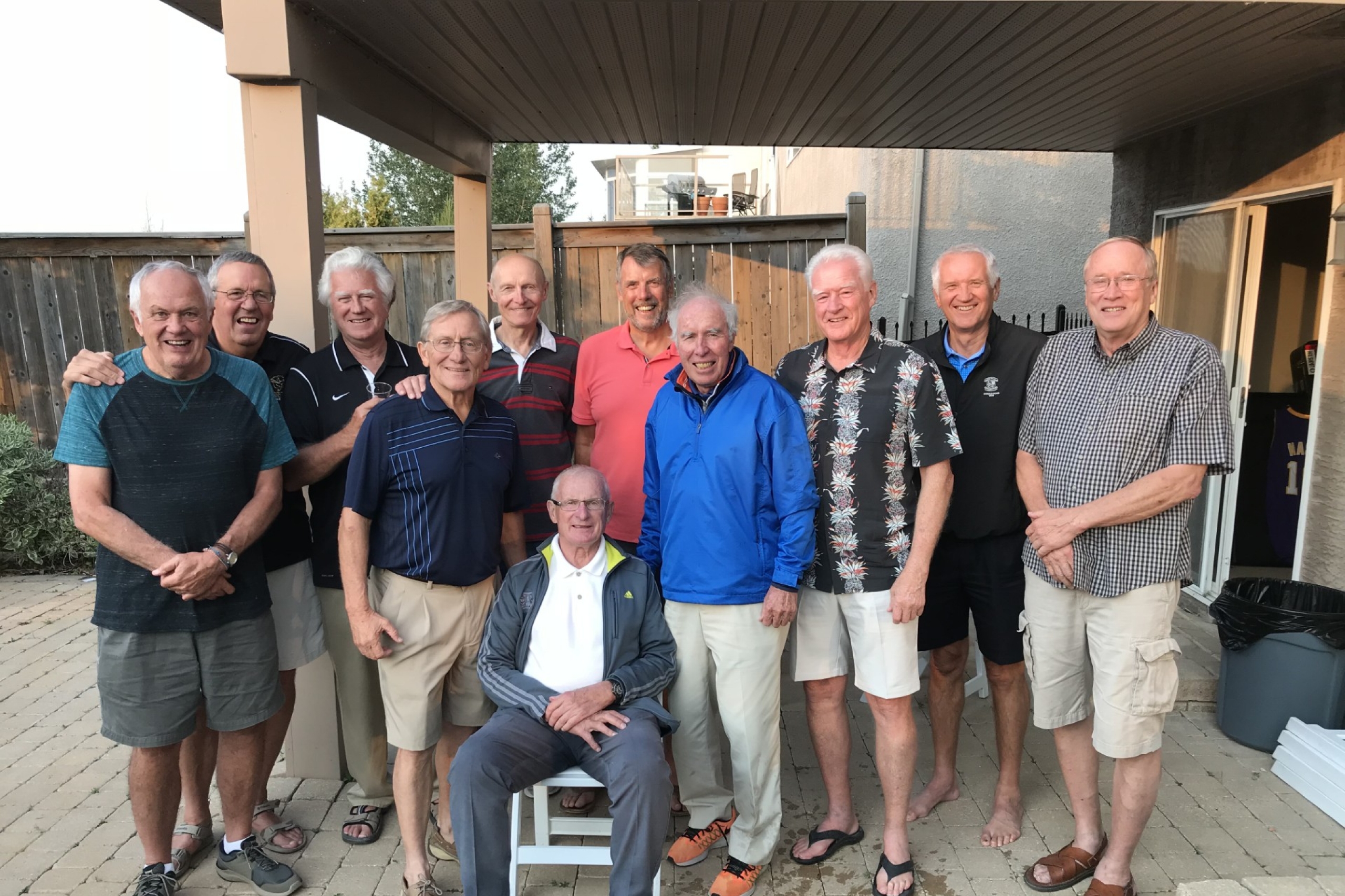 John Loewen with bisons mens basketball players from the 1970s