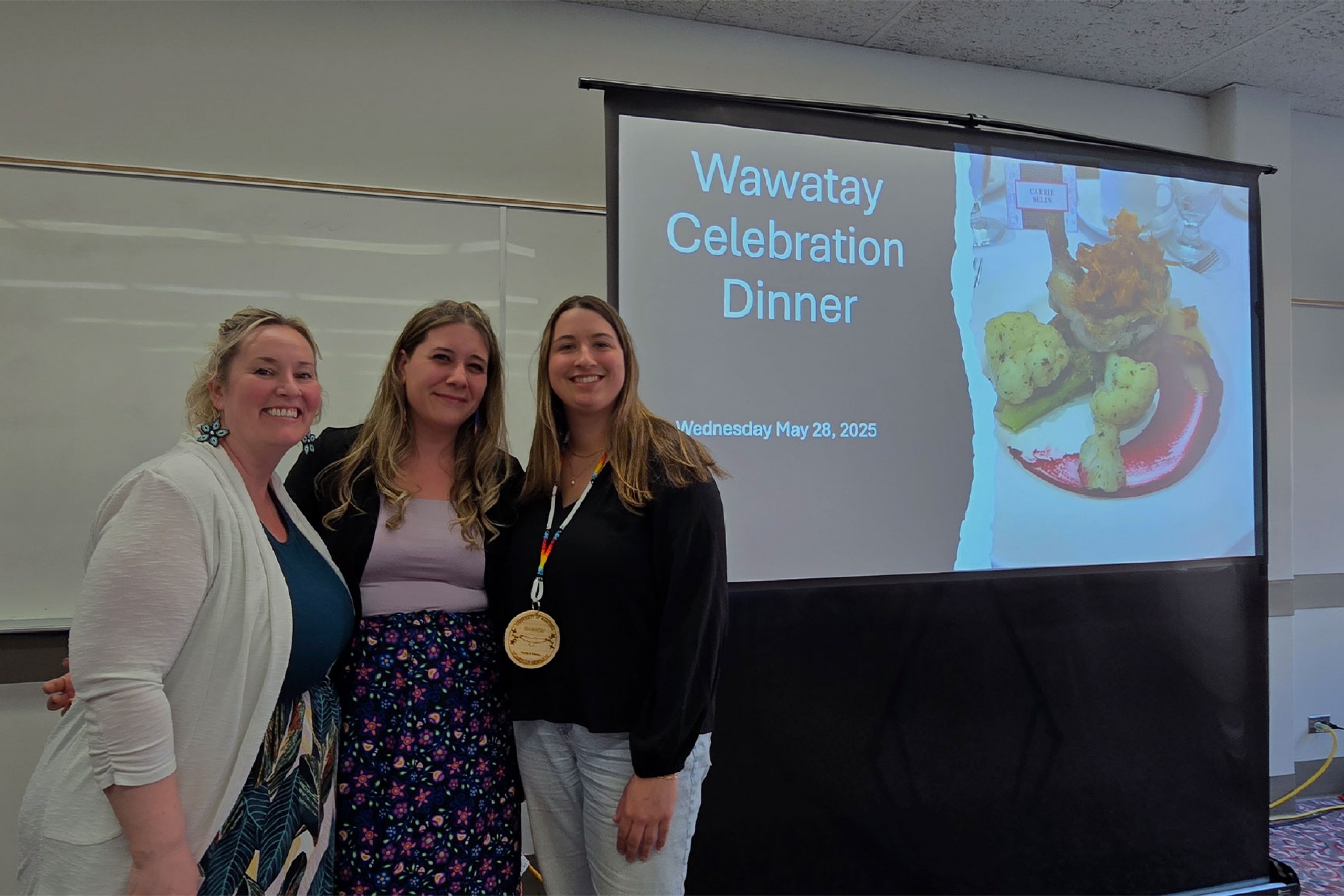 Carrie Selin, Melanie Lalonde and Jenessa Martel smiling at the camera.
