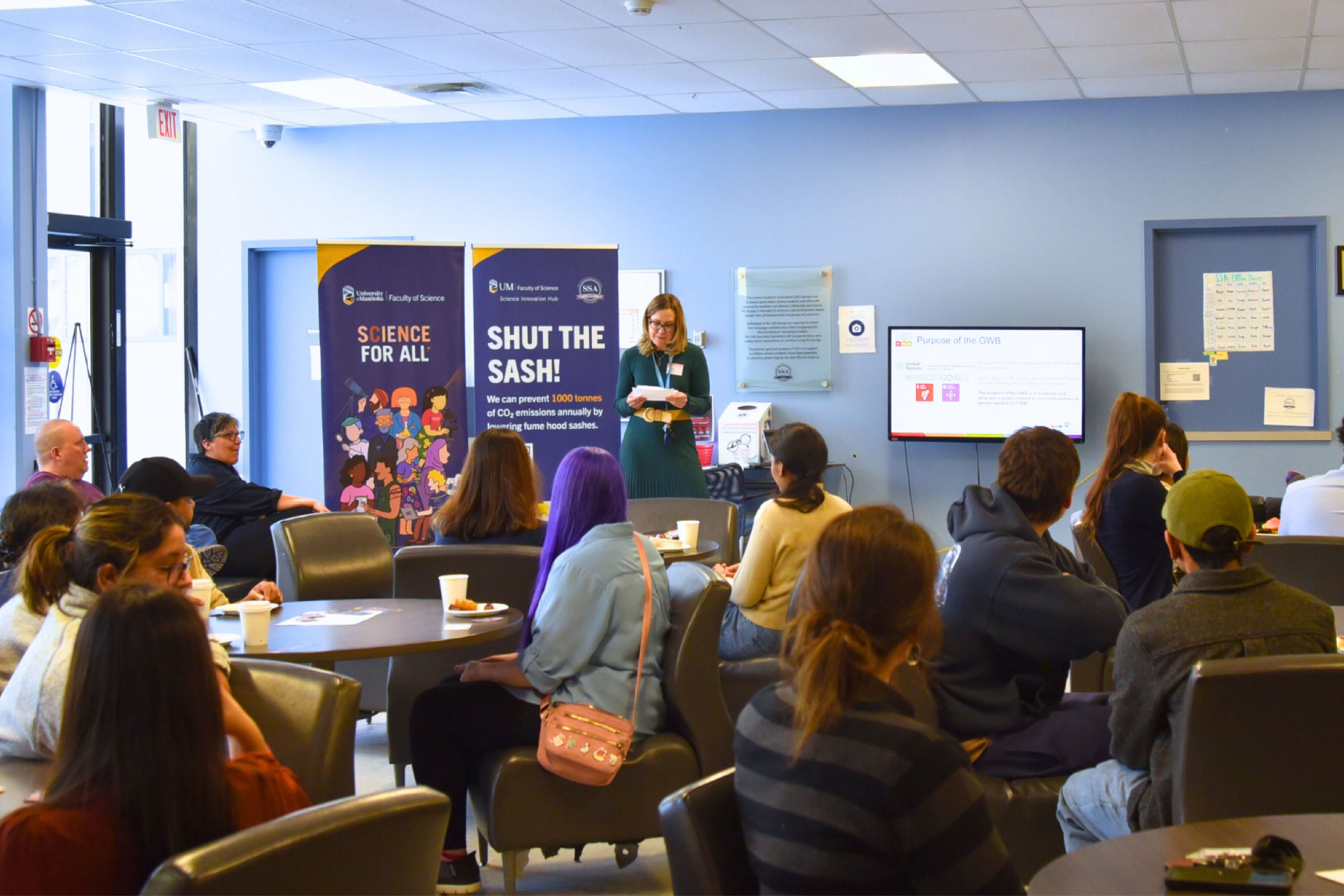 Angela Kuchison presenting during the chemistry breakfast event.