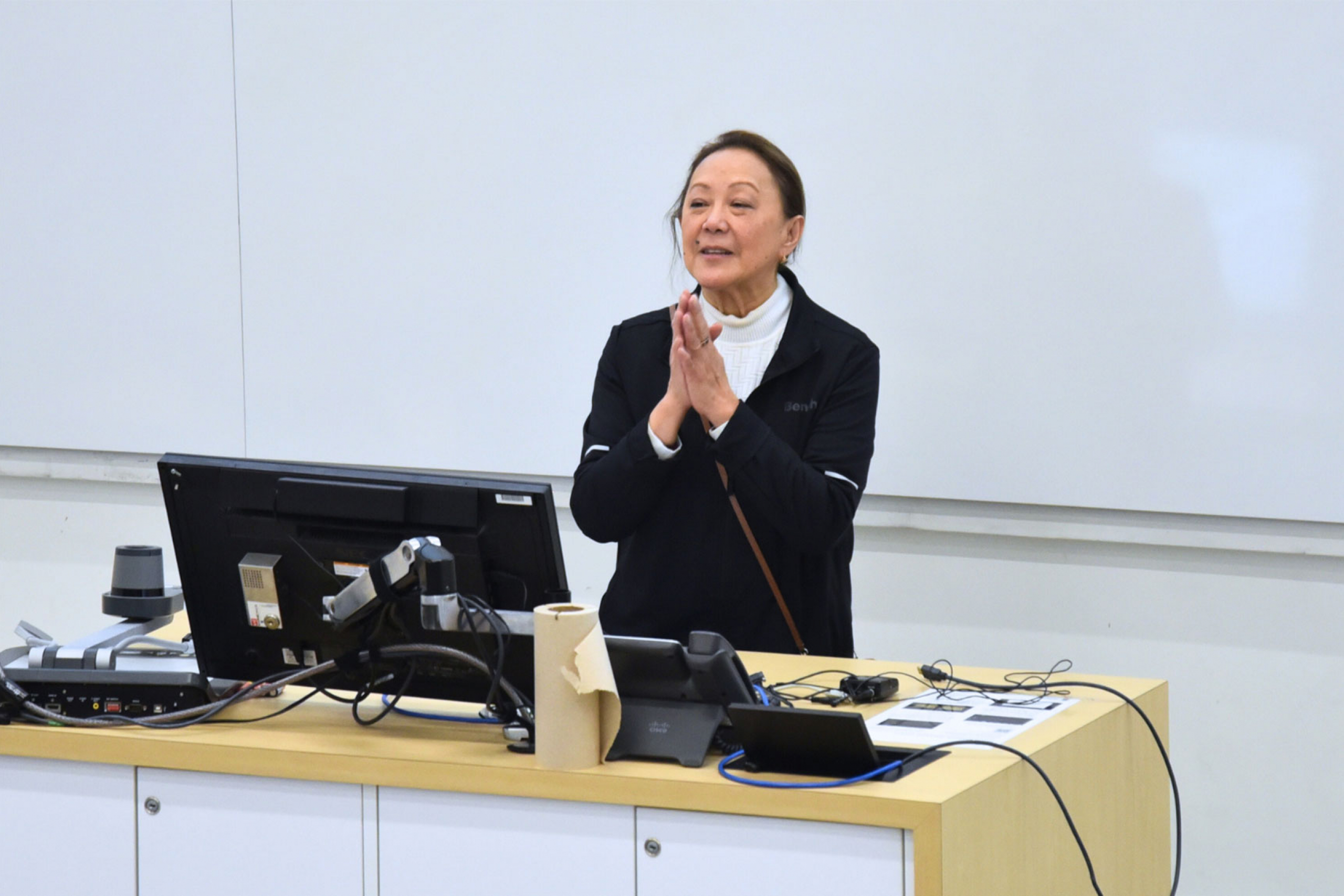 Cynthia Goh presenting during the academic talk.