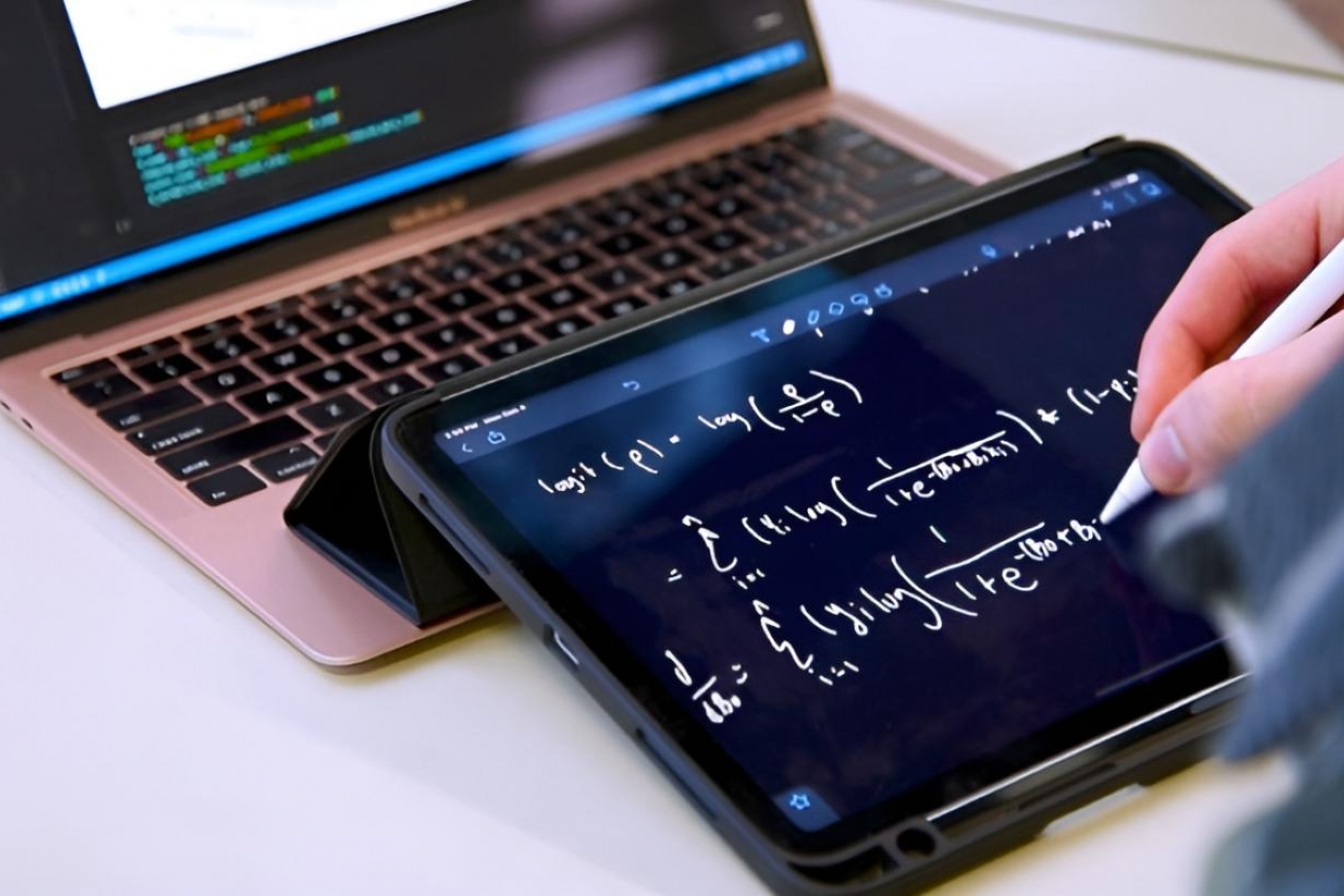 Data science student writing an equation