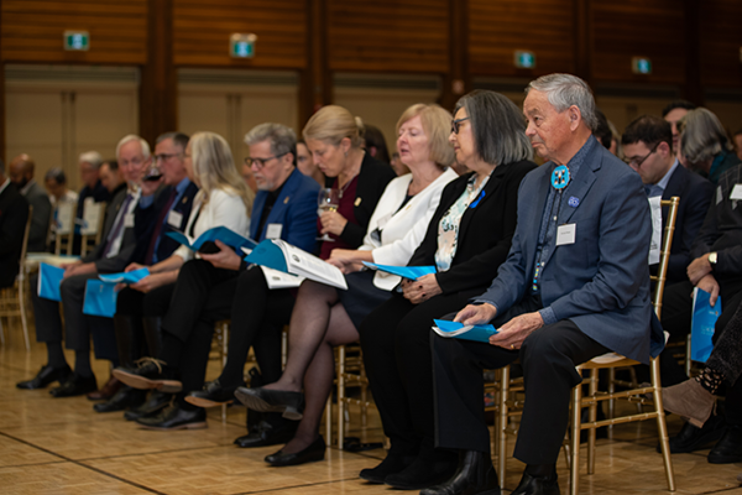 Elder Meade and some of Emeritus recipients seated at ceremony