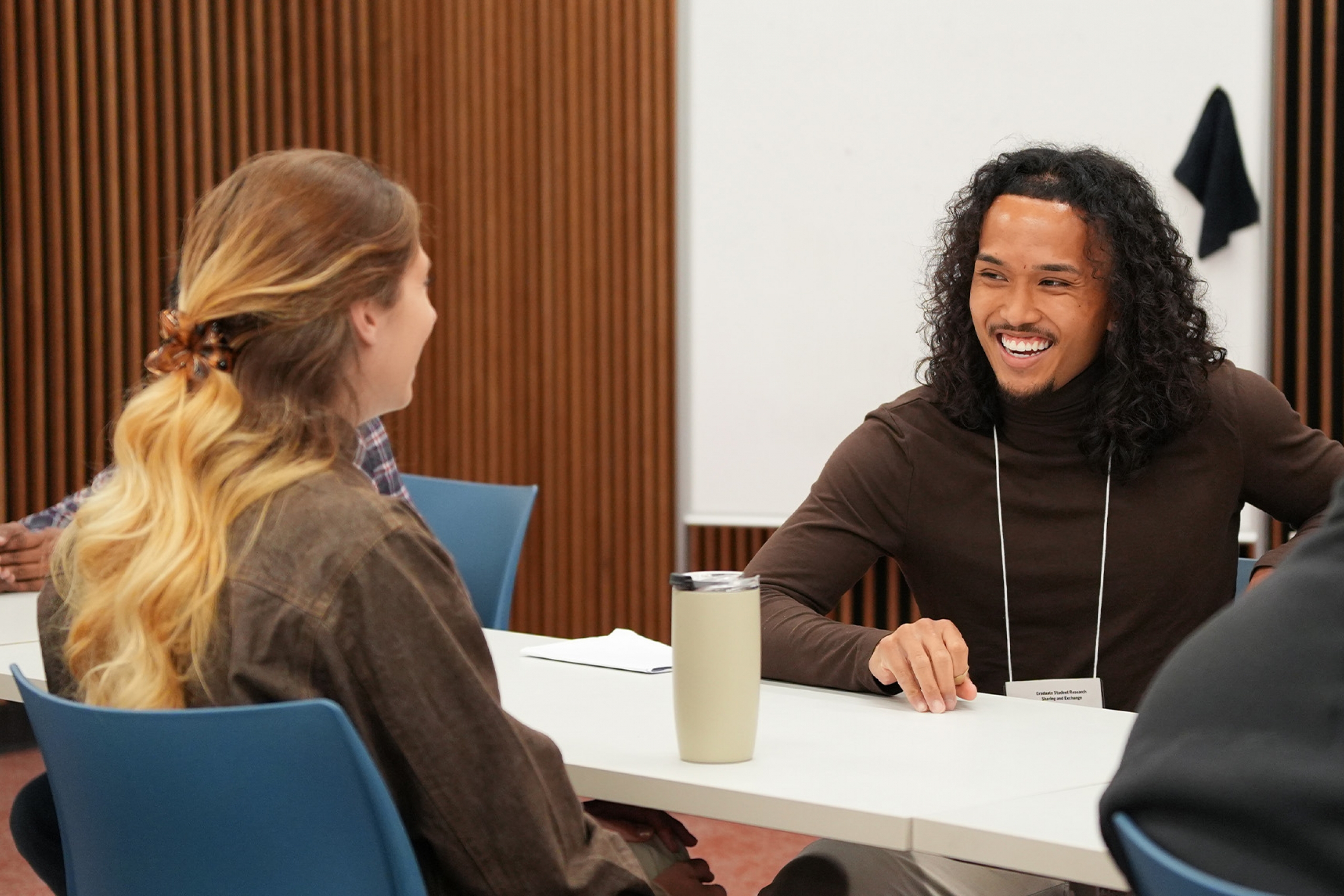 Two students chatting during a networking event