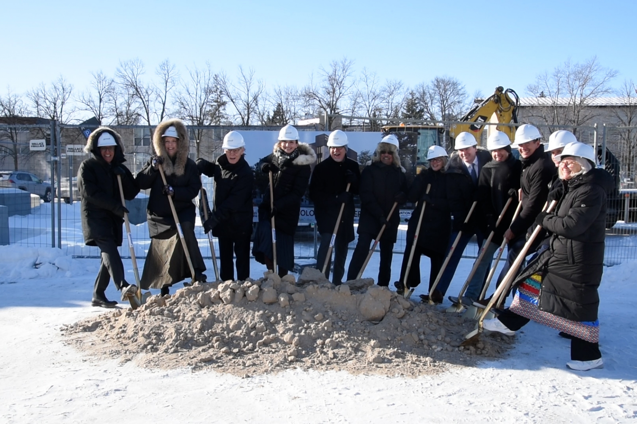 Group of people at a ground breaking