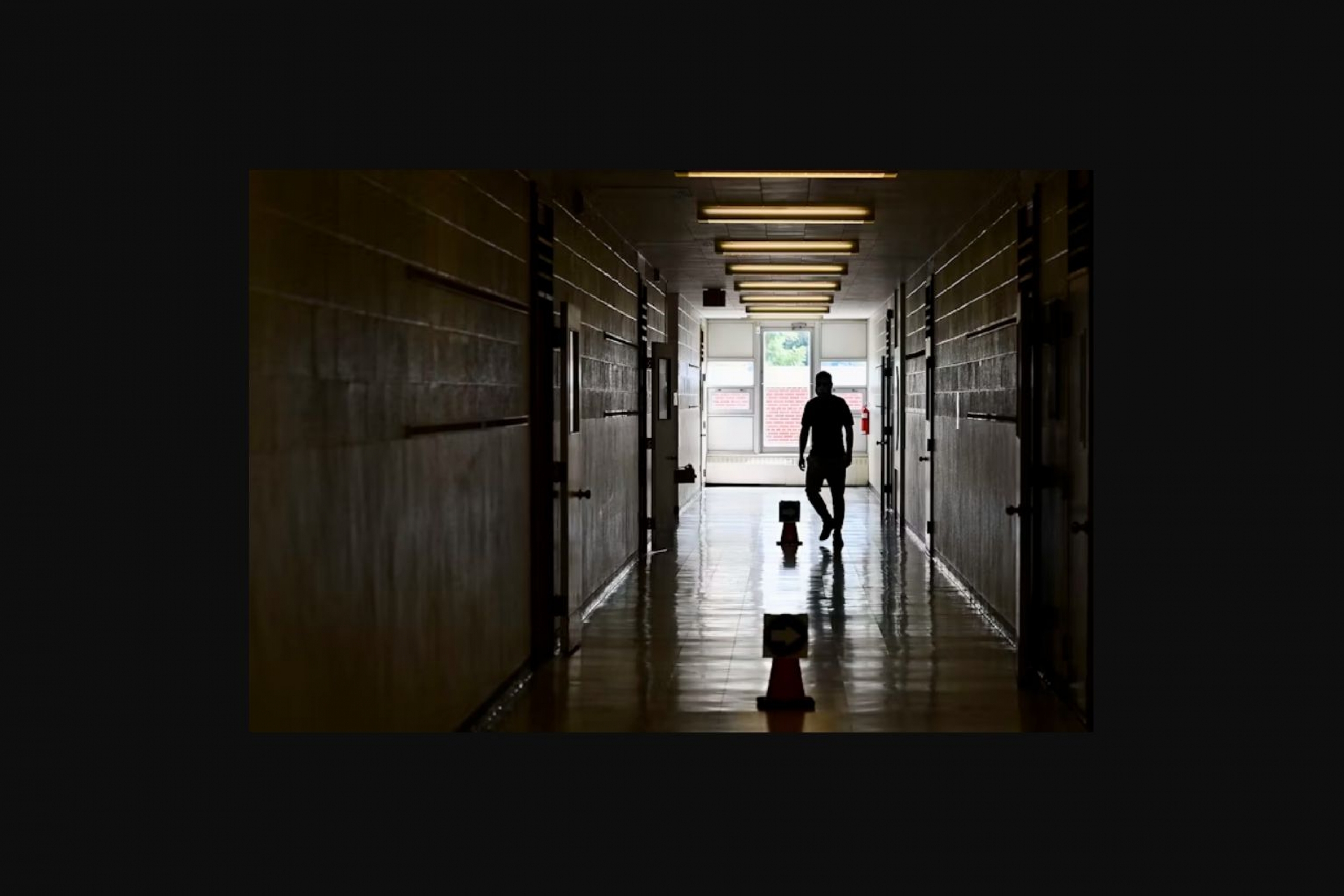 Photo of man in hallway