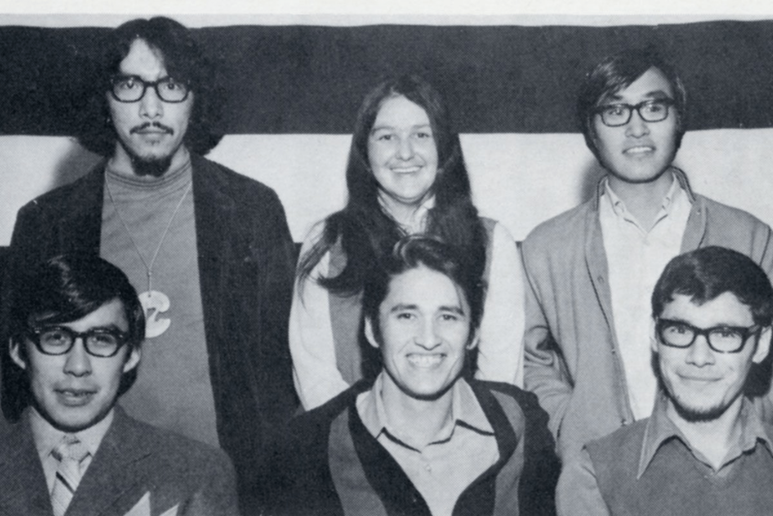 A black-and-white portrait of six early Indigenous student group members posing together in two rows.