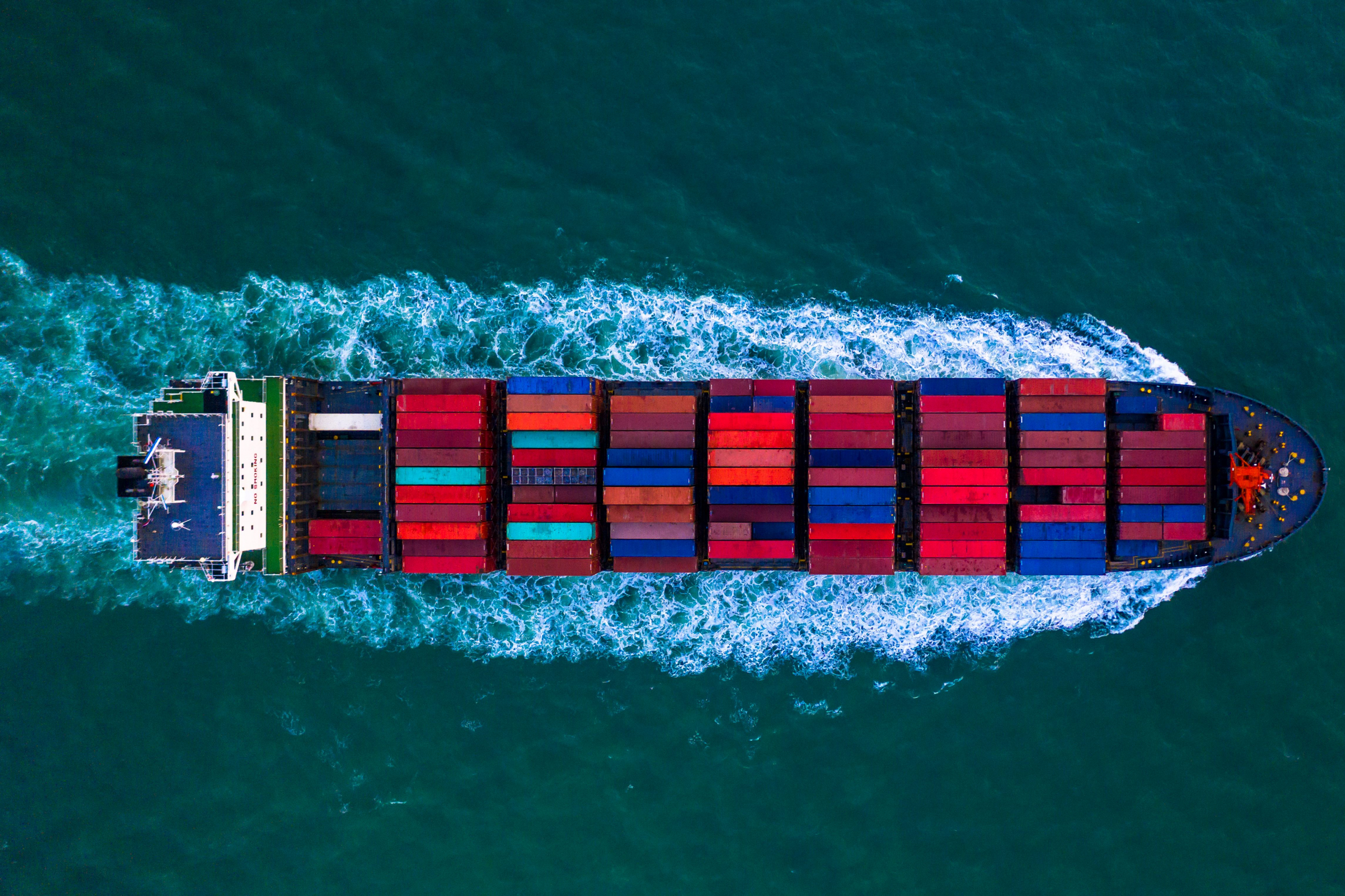 A shipping boat is seen from overhead
