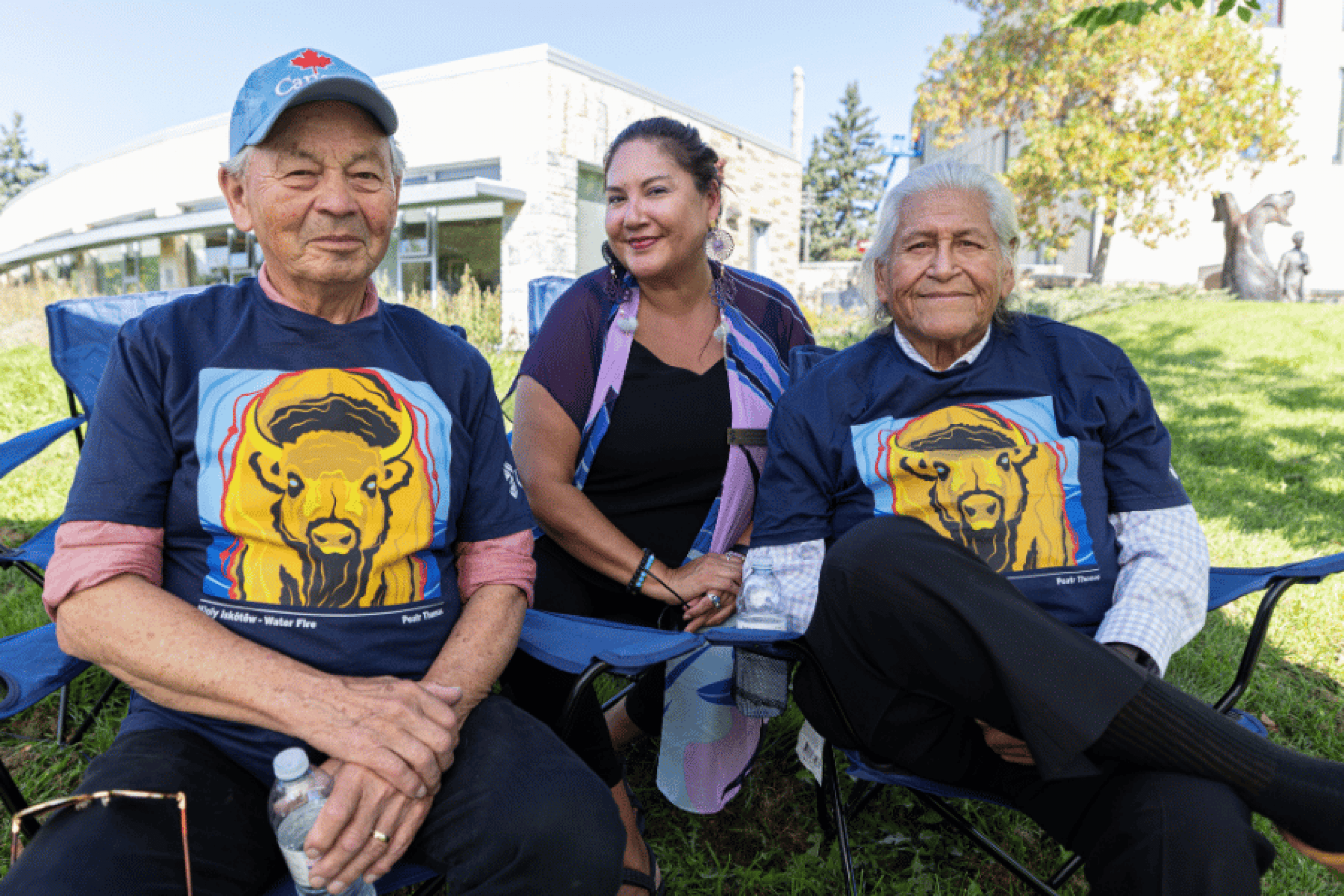 3. Elders and Carla Loewen gathering outdoors at Indigenous Orientation.