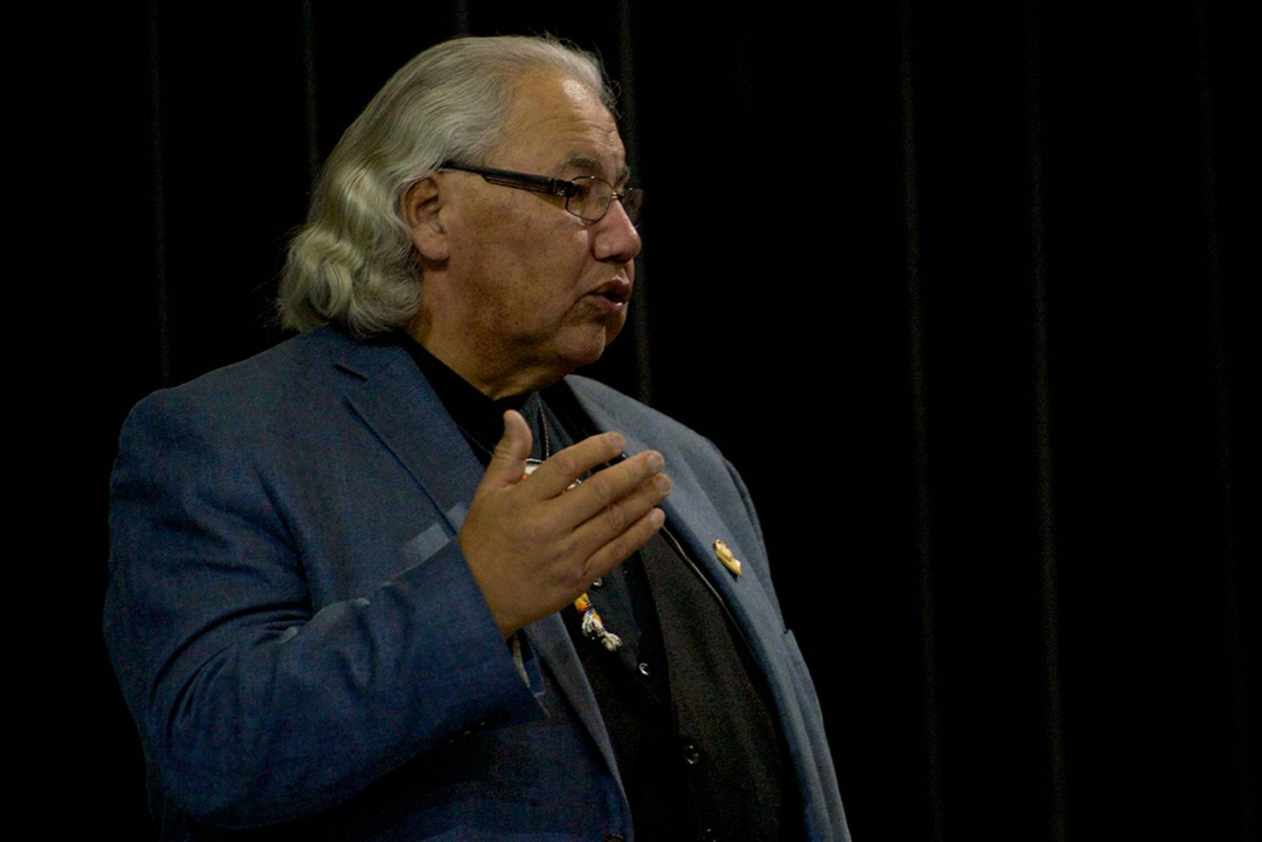 A close-up shot of Judge Murray Sinclair speaking.