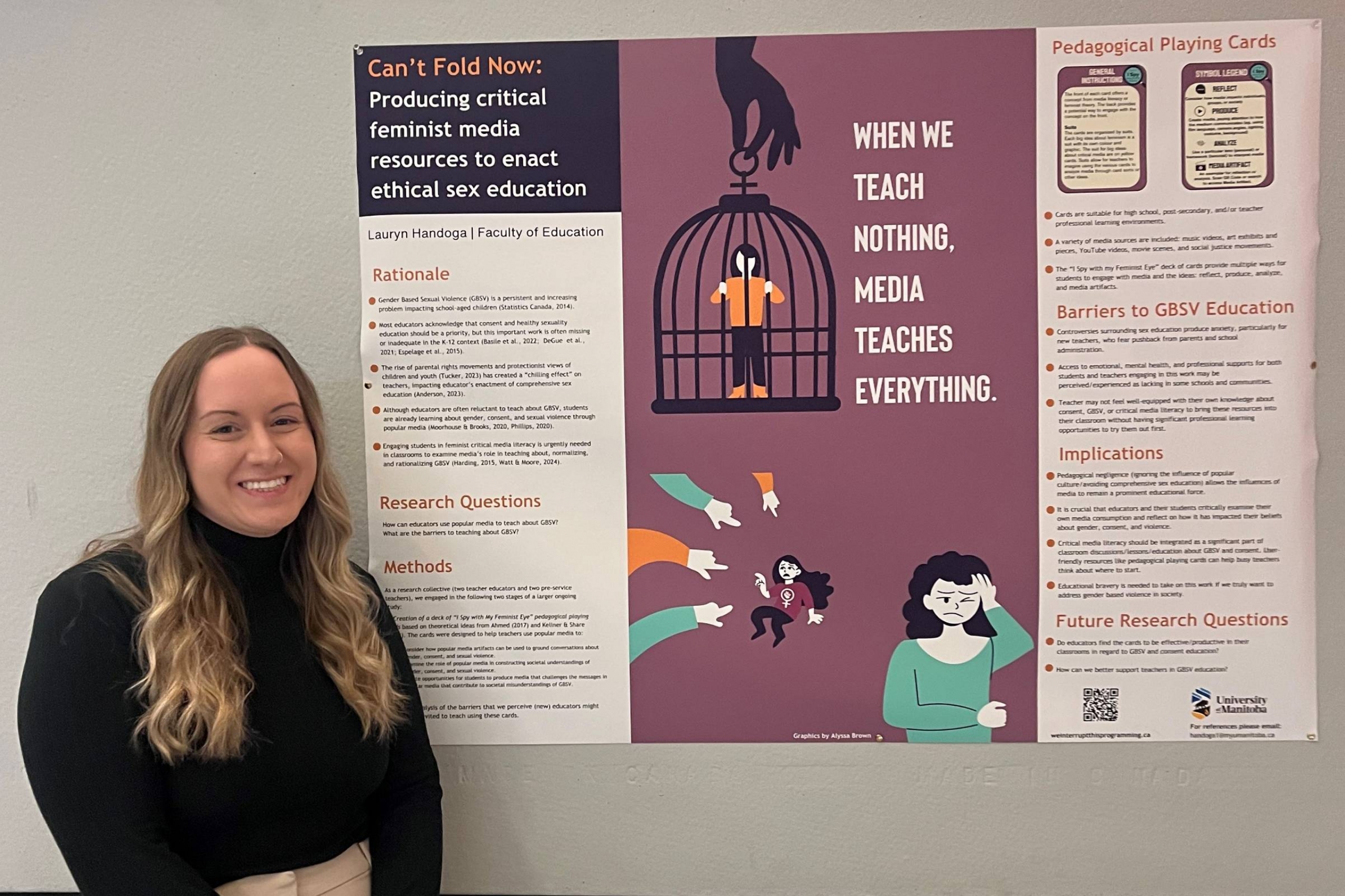a student stands in front of a research poster