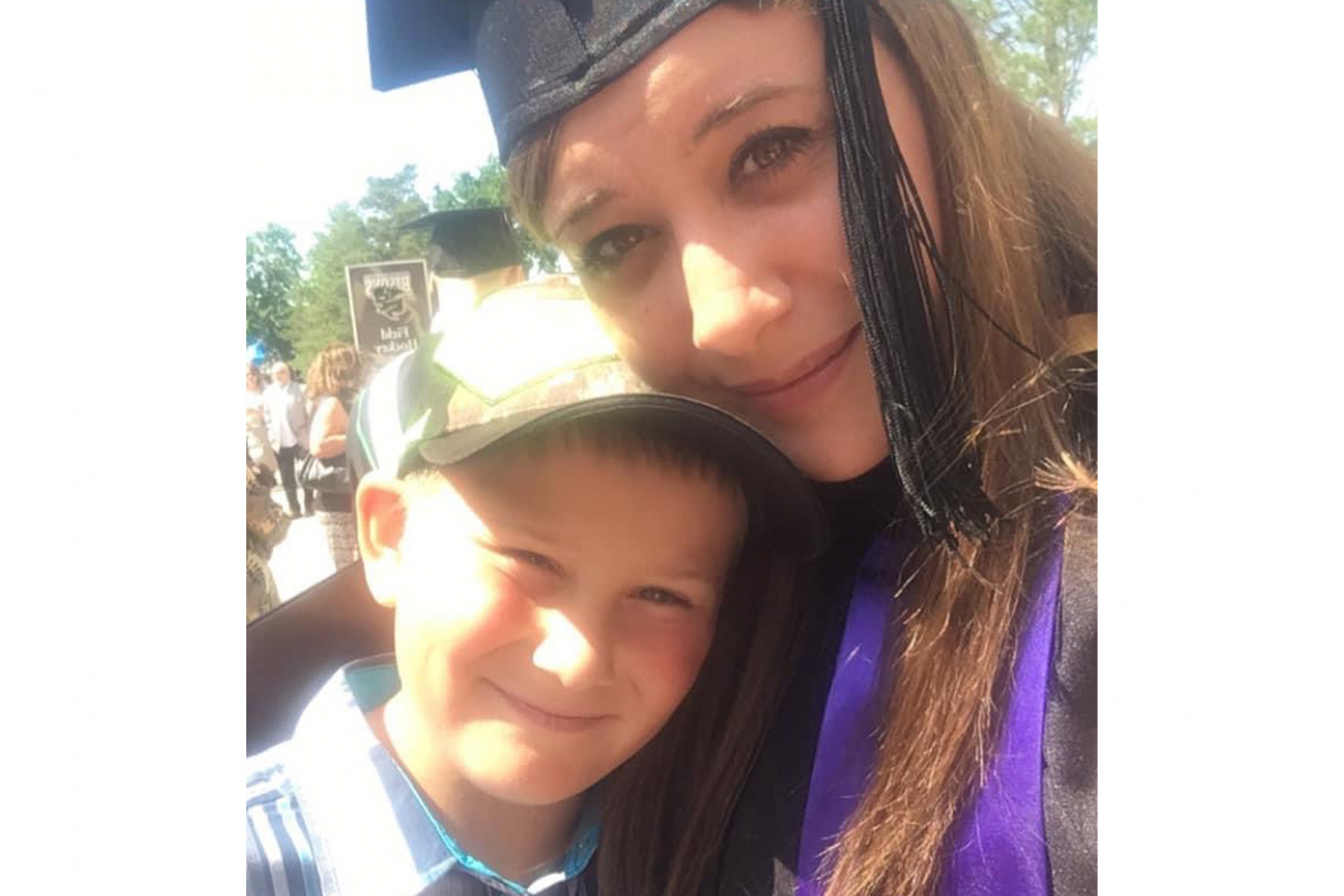 Melanie Lalonde with her son during her master's degree graduation.