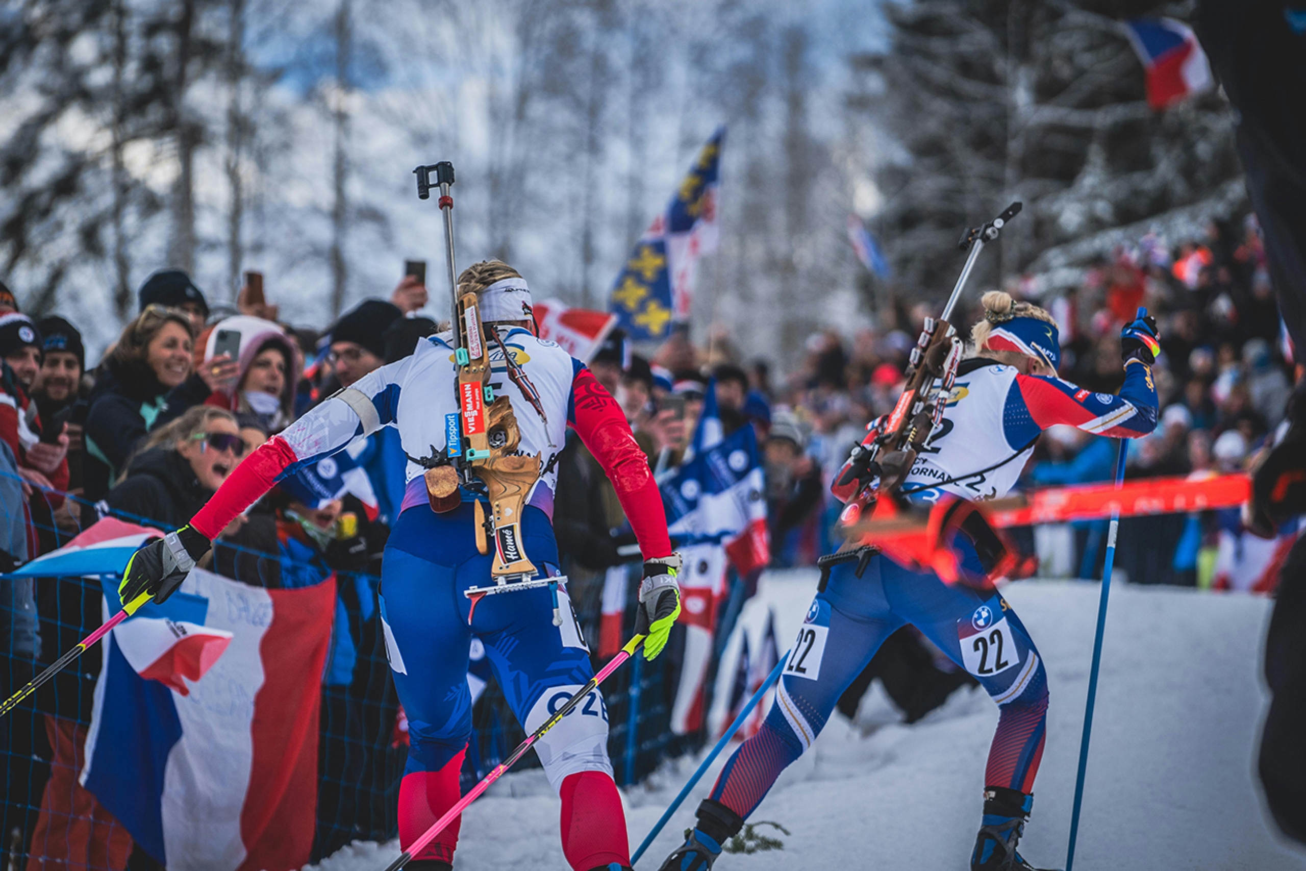 Dynamic Biathlon race with enthusiastic Crowd.