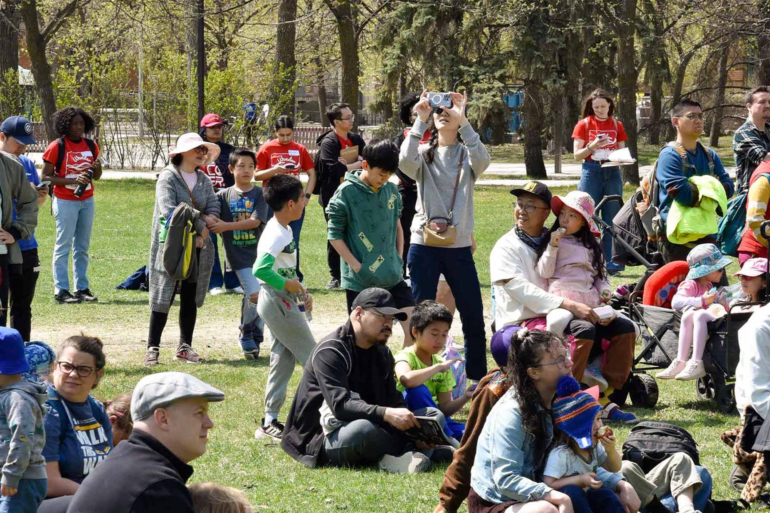 A crowd of people watching the Prairie Wildlife Show.
