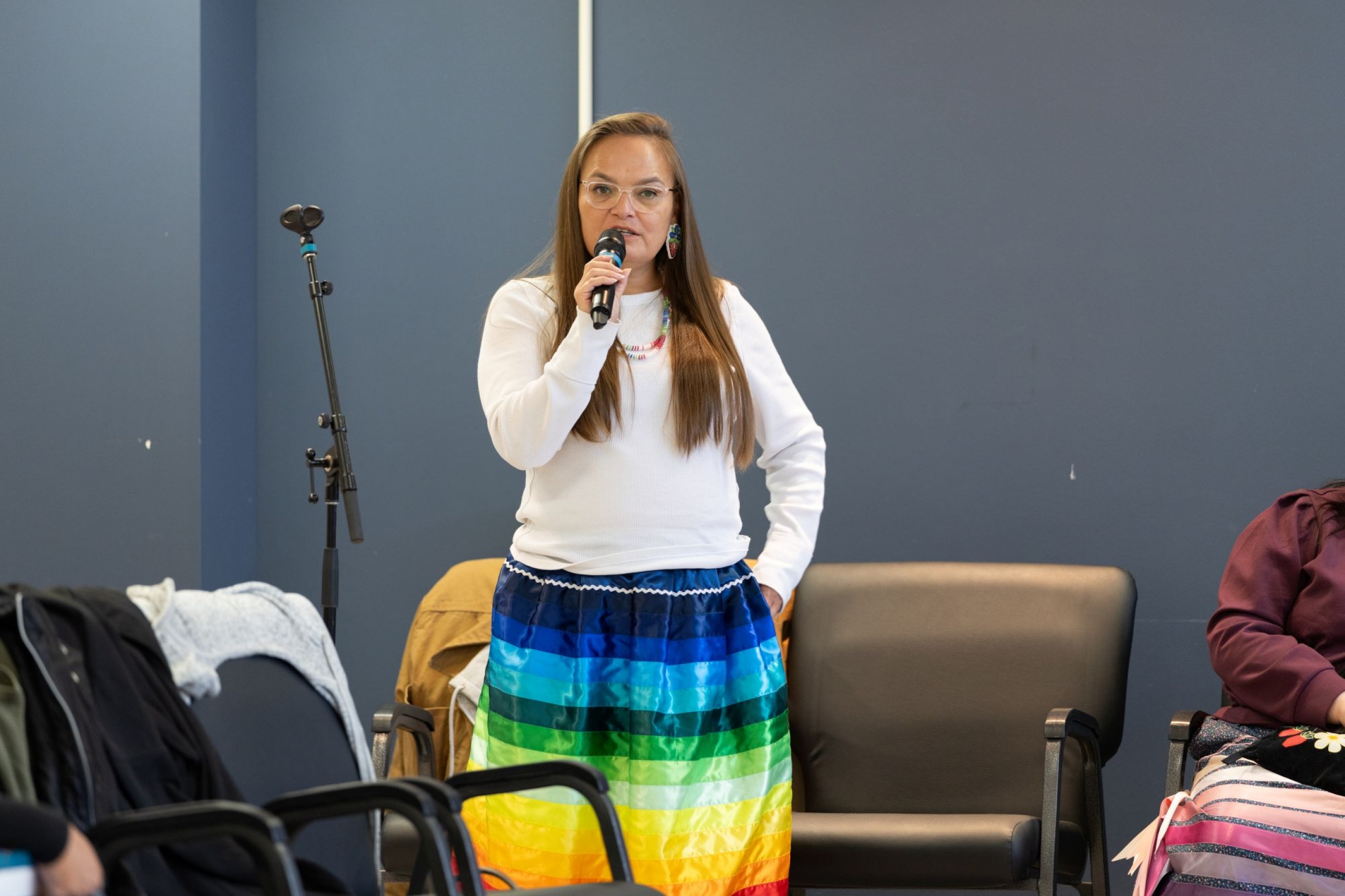 Ramona Milliea speaking into a microphone