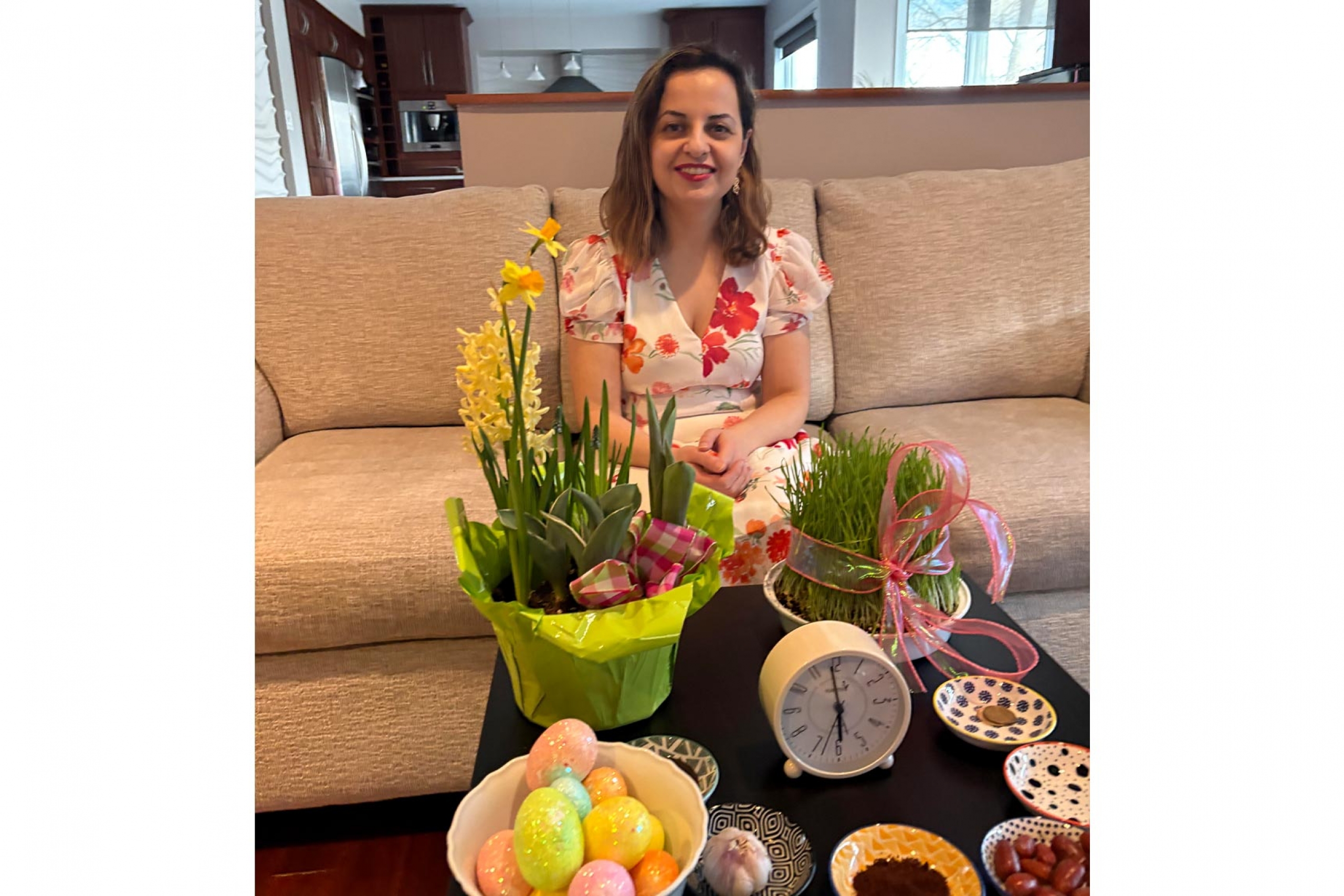 Sadaf Salehkaleibar during nowruz celebration smiling at the camera.