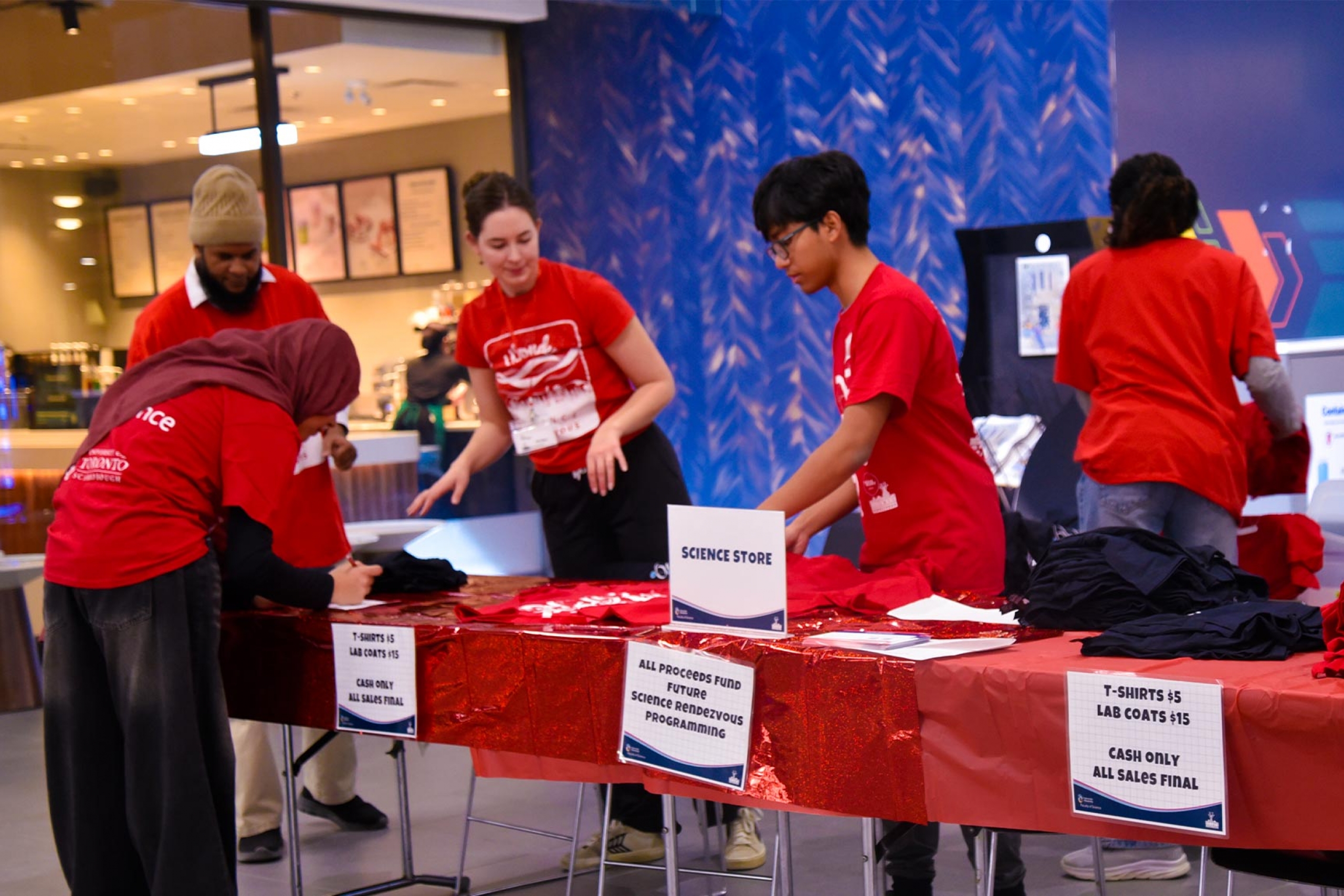 A group of volunteers at the science store booth.