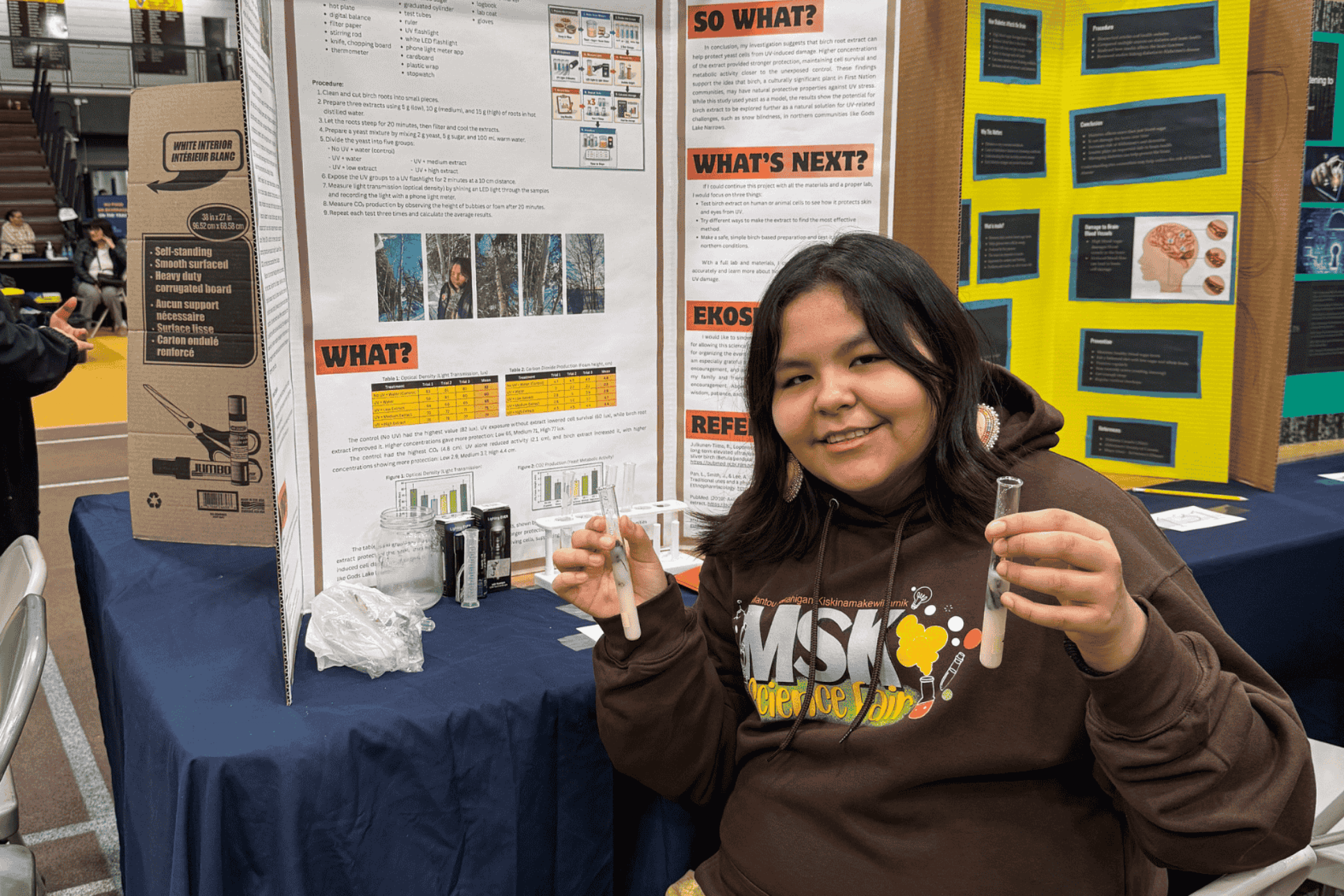 Student science fair display featuring a large handmade bingo board experiment