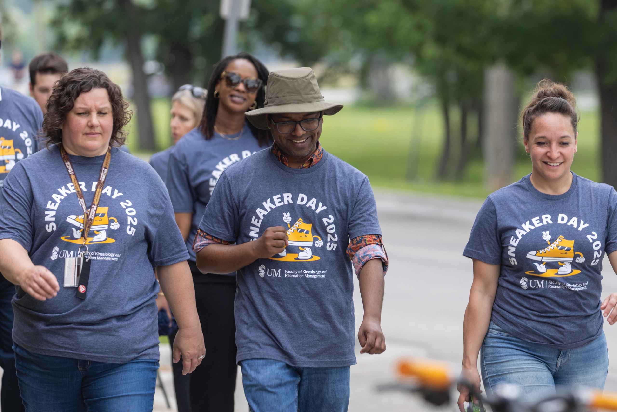 People walking outside during Sneaker Day.